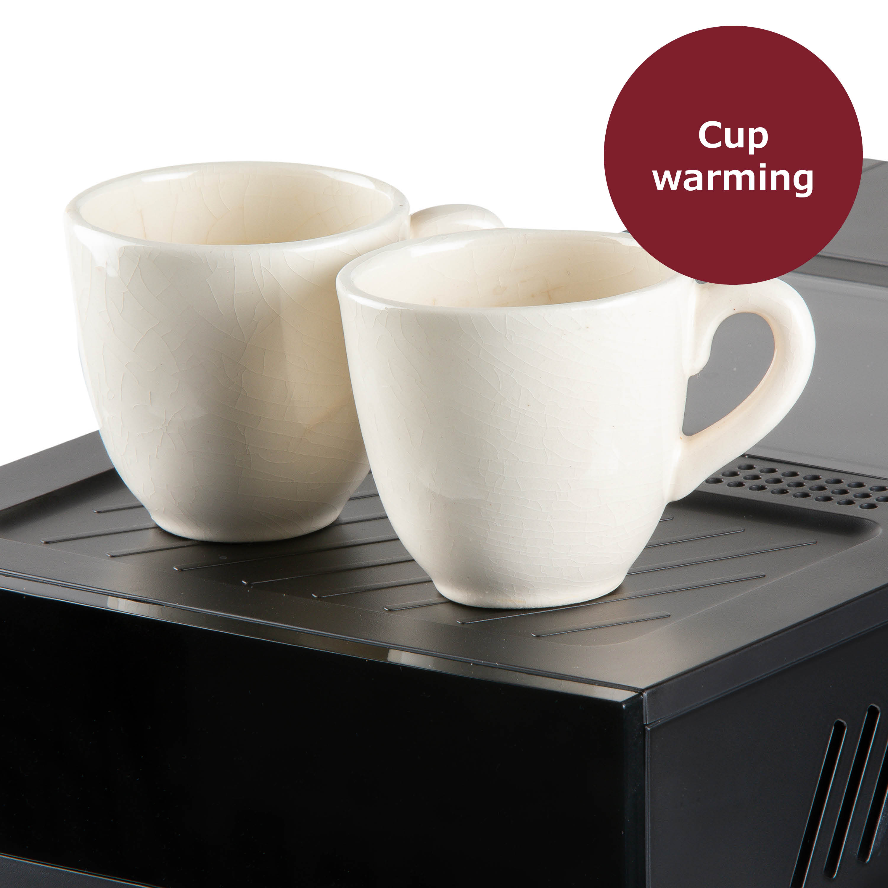 Deux tasses en céramique blanche reposent sur une plaque chauffante noire. Un cercle rouge indique le réchauffement des tasses.