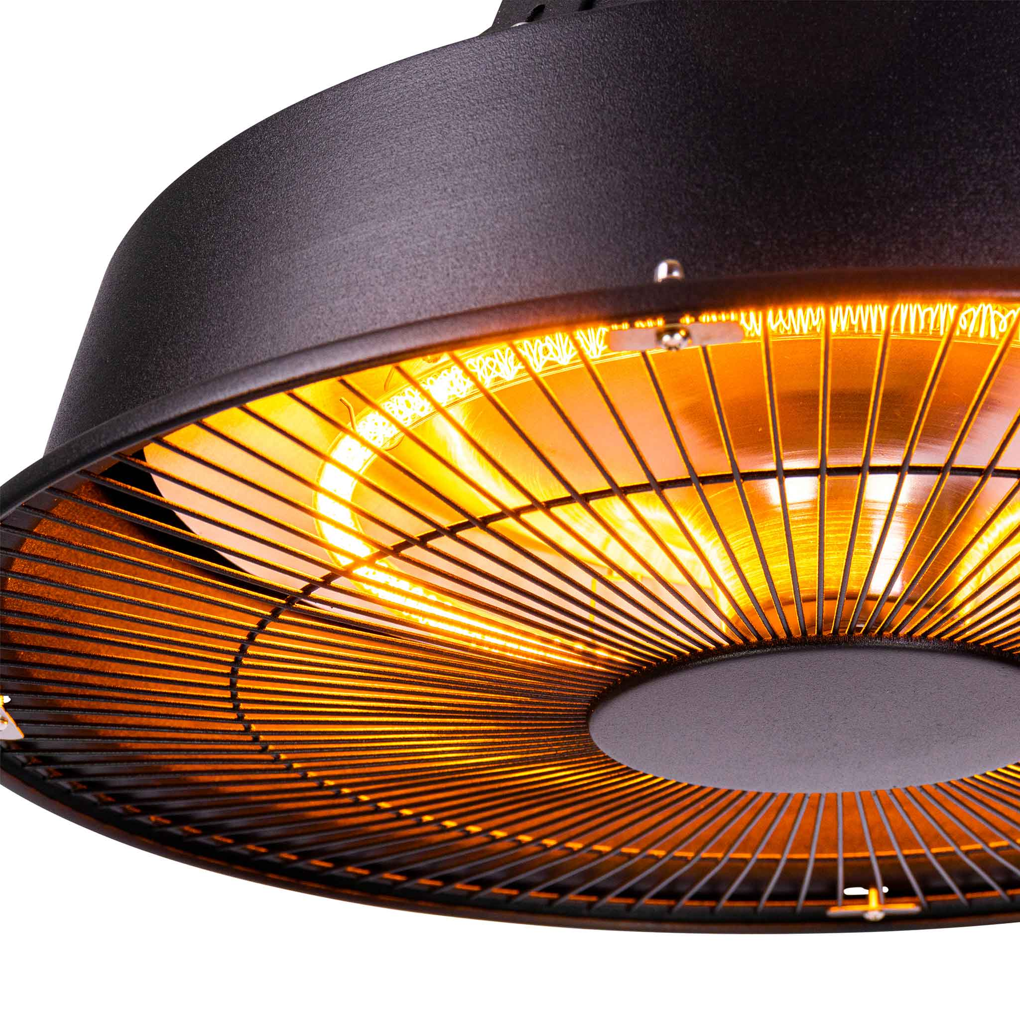 Nahaufnahme eines schwarzen, an der Decke montierten Heizkörpers. Das Licht ist orange. Der Grill ist sichtbar.