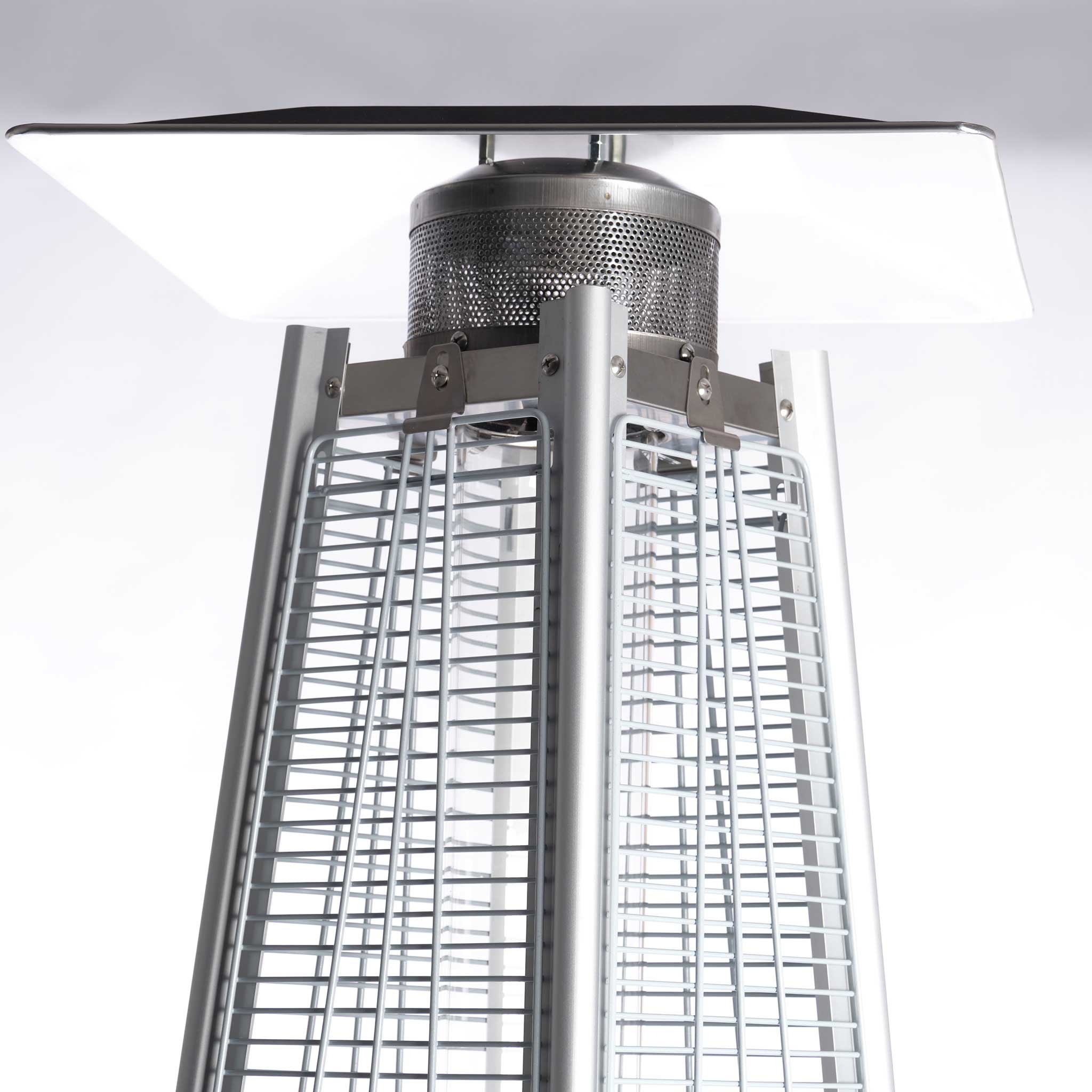 Wysoki, srebrny grzejnik zewnętrzny z białym dachem i drucianym korpusem.