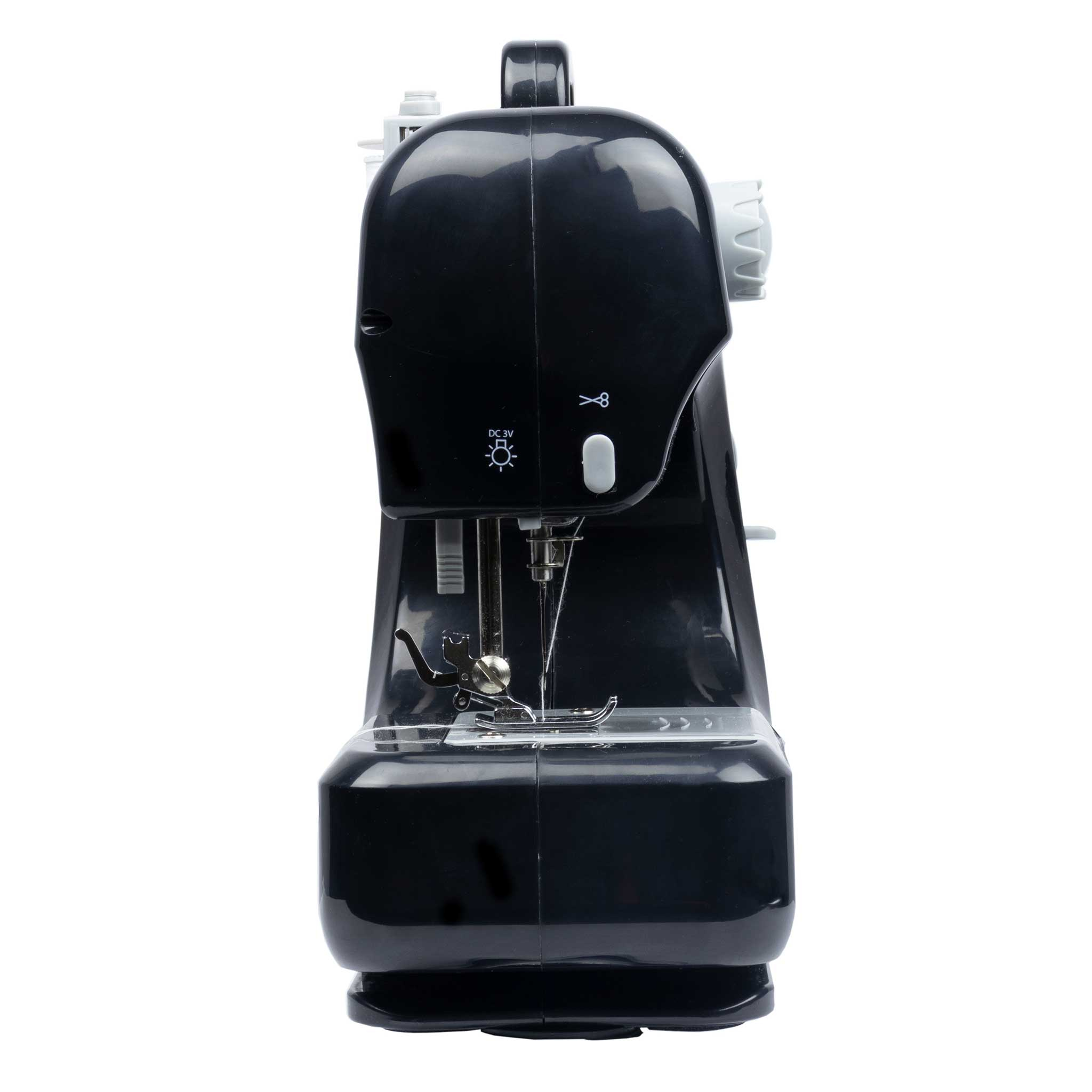 Czarna maszyna do szycia z białą górą. Białe tło.