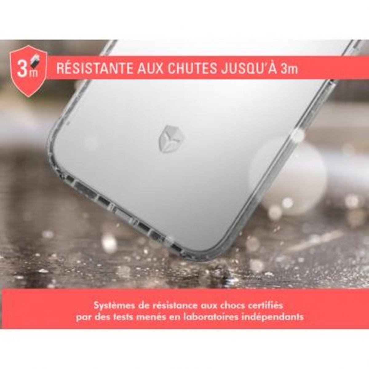 Custodia trasparente per telefono. Su una superficie con detriti bianchi. Testata per cadute da 3 metri.