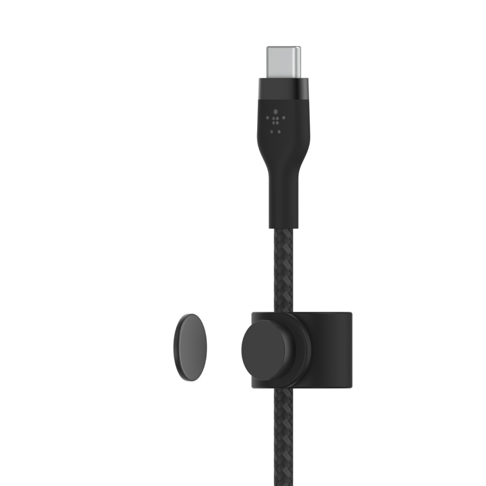 Câble USB-C noir et son support. Le câble est connecté au support.