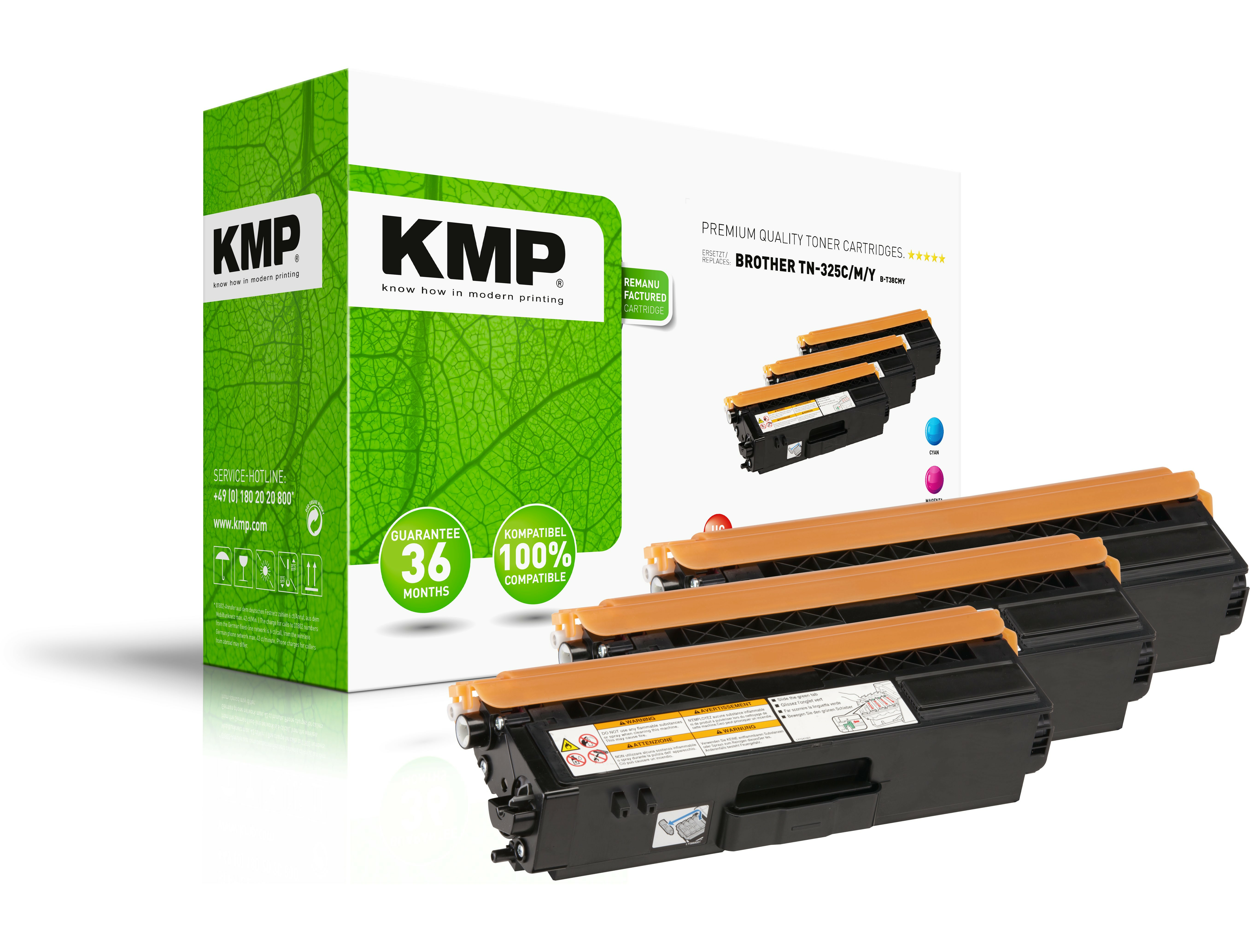 Cartuchos de tóner KMP. Varios cartuchos naranjas, una caja verde en el fondo.