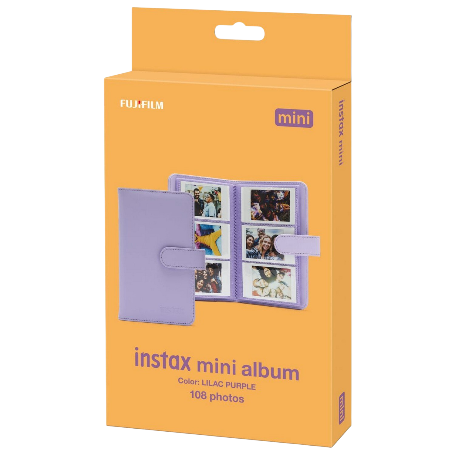 Liliowy album Instax Mini i pudełko ze zdjęciami, na pomarańczowym tle.