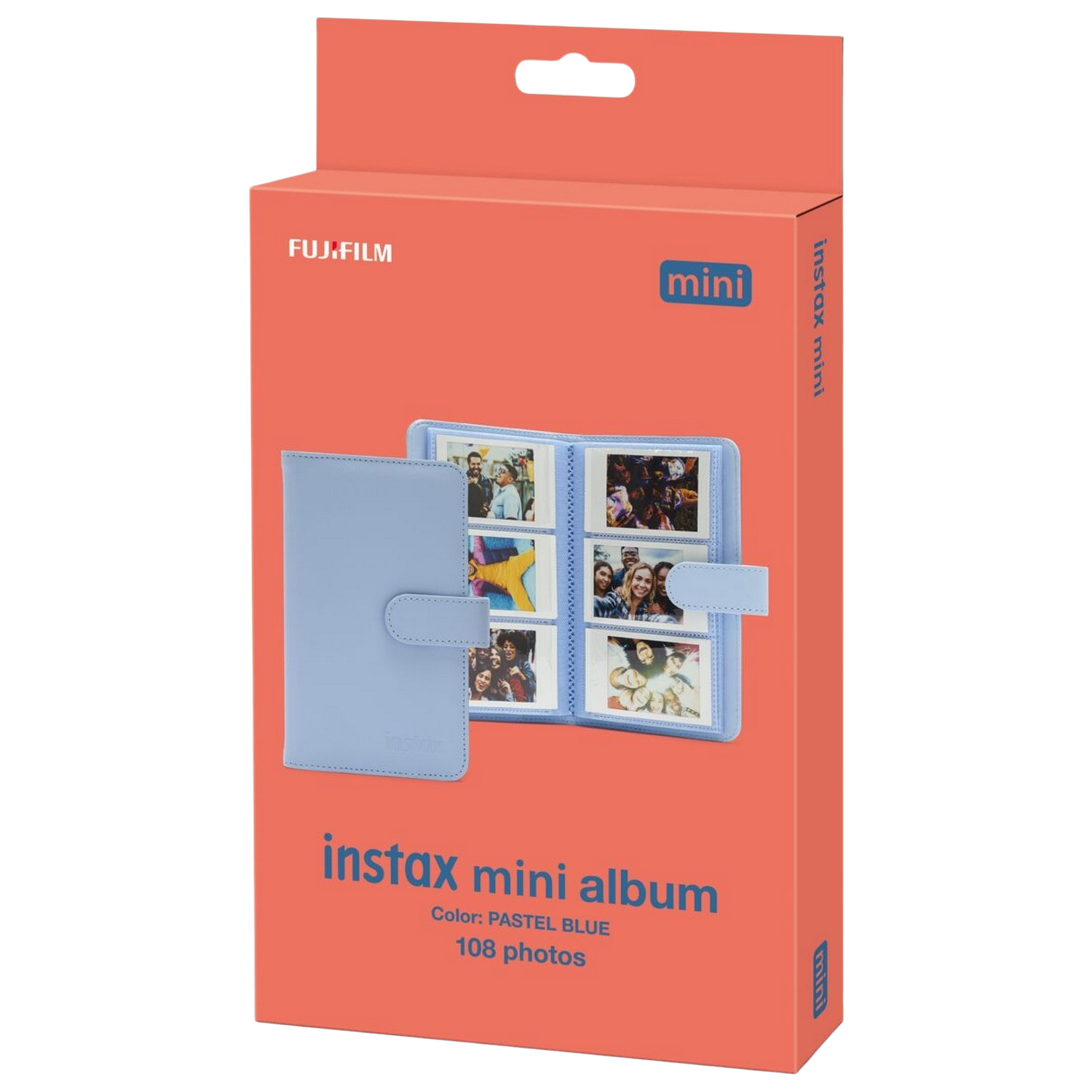 Czerwone pudełko z albumem fotograficznym. Album jest niebieski i pokazuje zdjęcia.