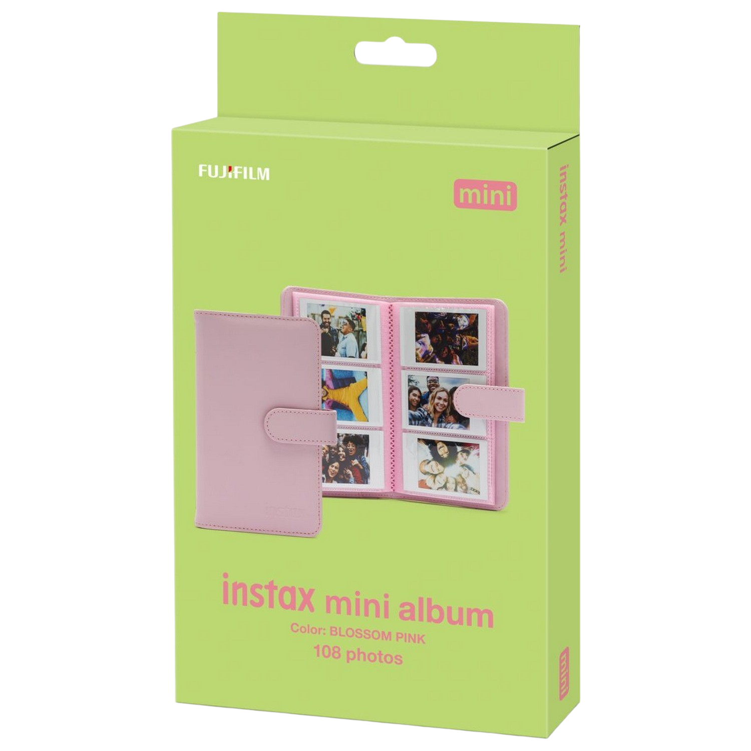 Różowy album instax mini, z zielonym pudełkiem i zdjęciem ludzi.