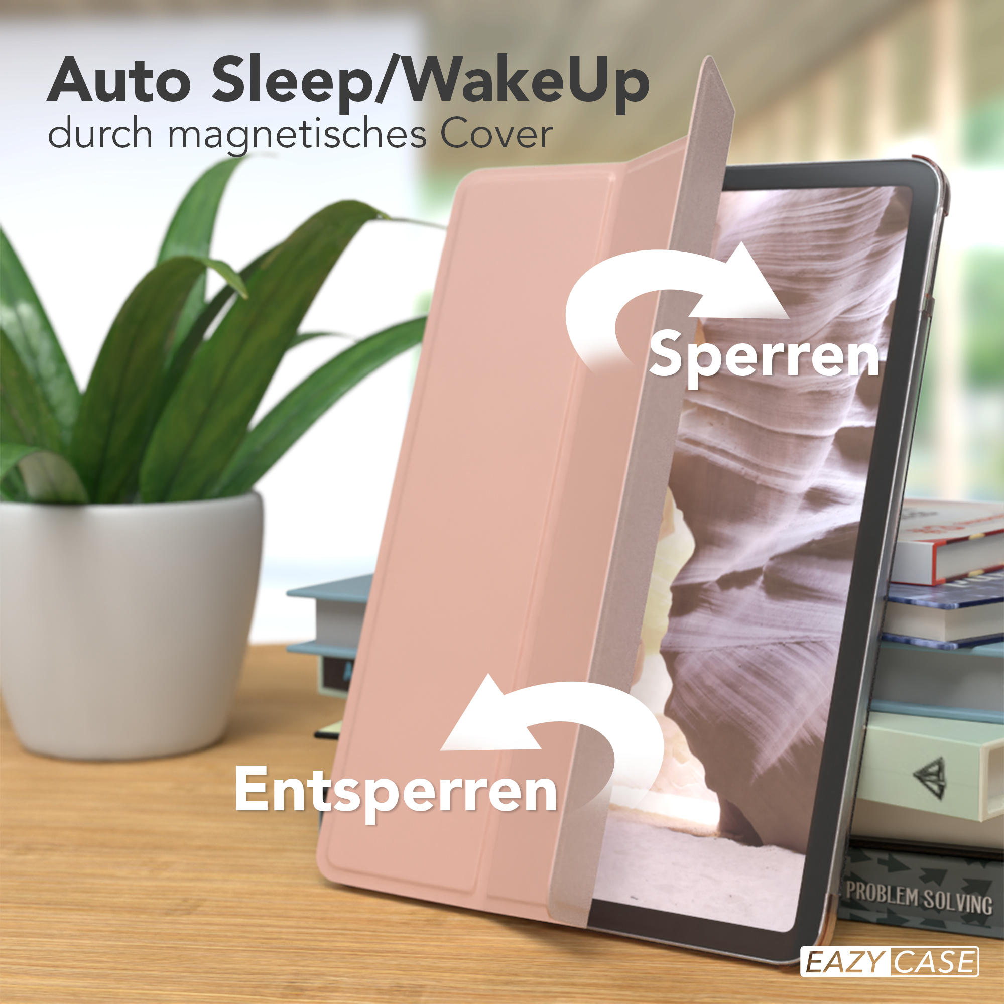 Tablet mit rosa Hülle, geöffnet, um den Bildschirm freizulegen. Pflanze & Bücher im Hintergrund.