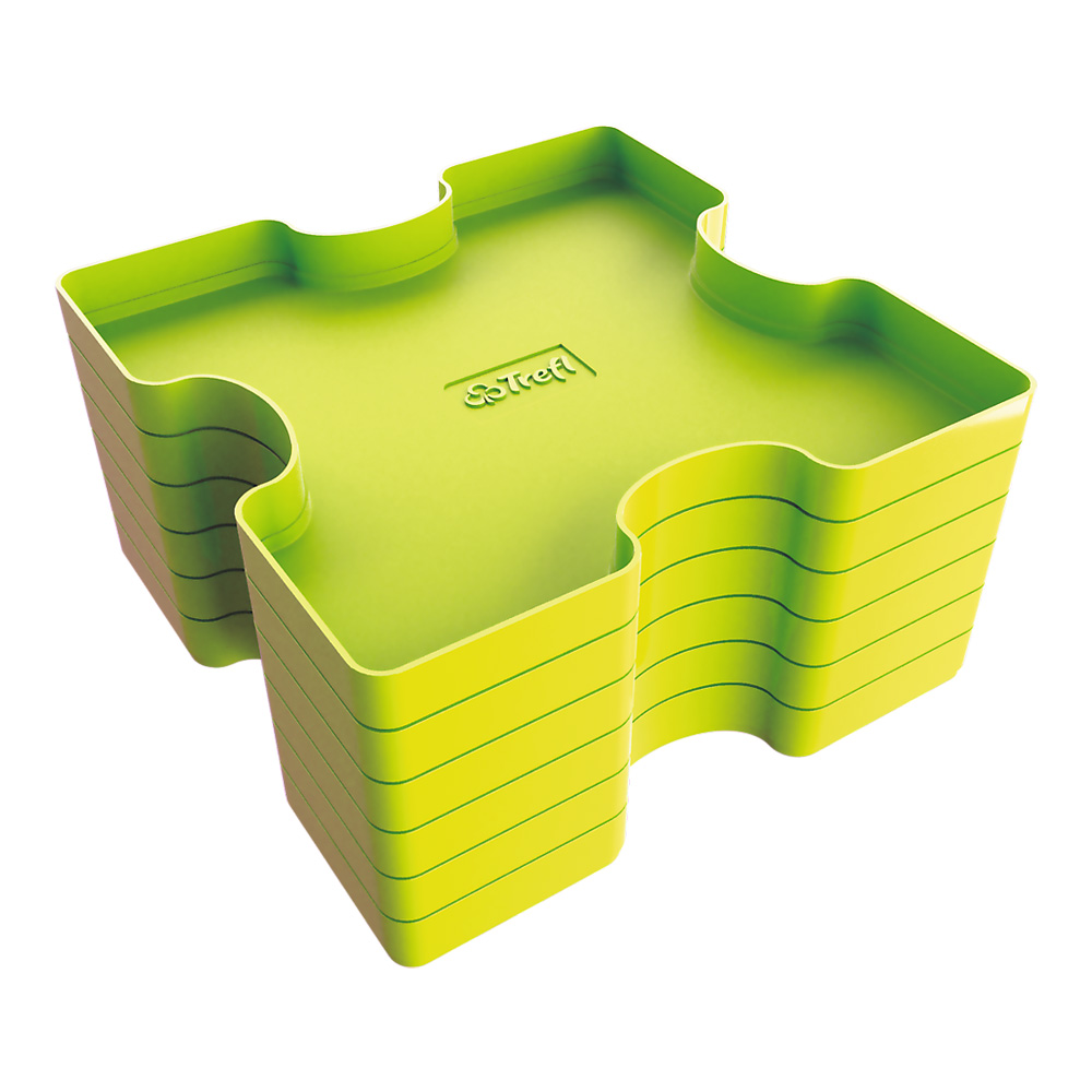 Un contenitore verde a forma di puzzle con più strati e uno sfondo bianco.
