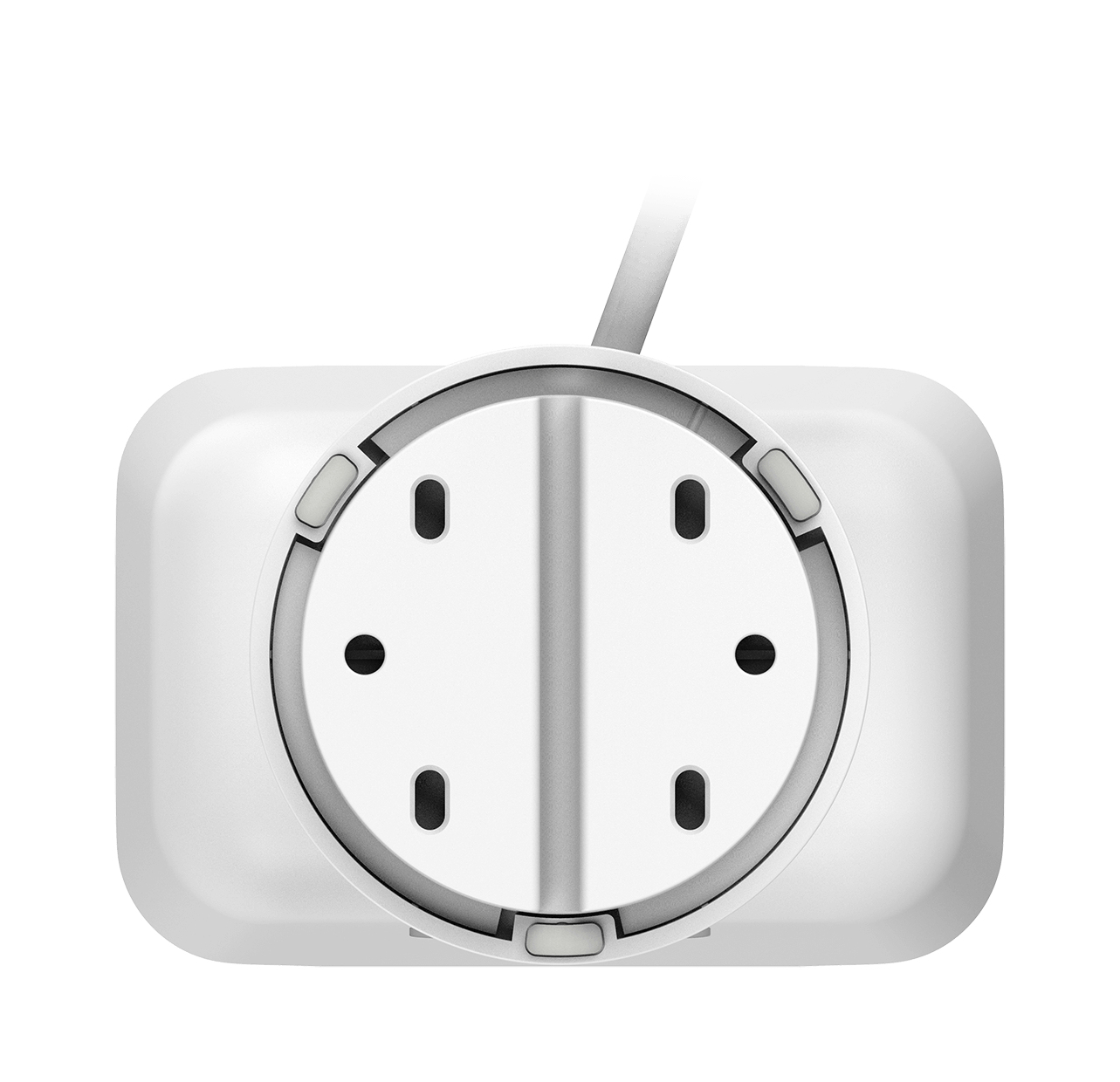 Białe urządzenie, widok od spodu, z czarnymi otworami i szarymi gumowymi podkładkami.