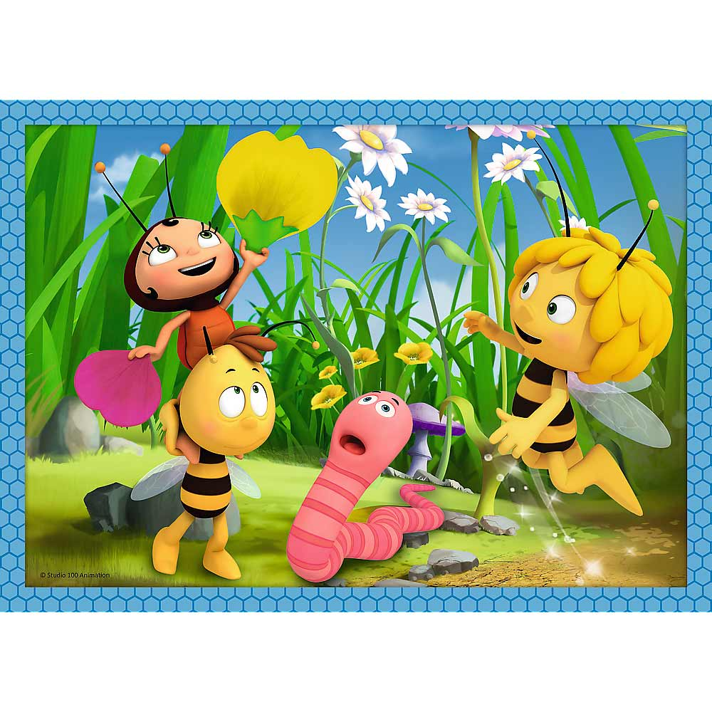 Un rompecabezas con Maya la Abeja y sus amigos jugando en un jardín.
