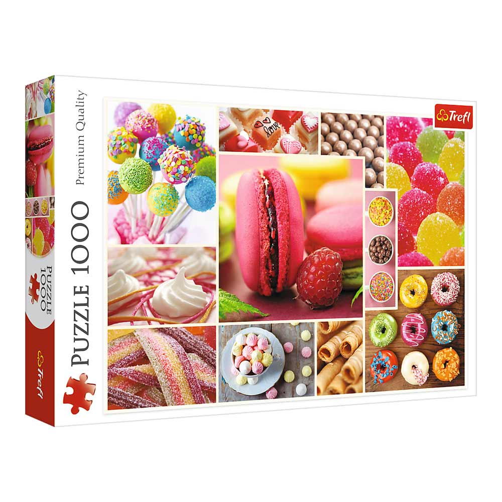 Pudełko z puzzlami z różnymi słodyczami. Pokazano makaroniki, żelki, pączki i inne kolorowe cukierki.