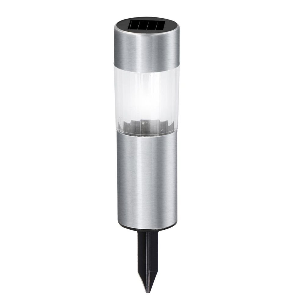 Zilveren zonne-tuinlamp met zwarte spike. Transparant bovendeel, licht aan. Witte achtergrond.