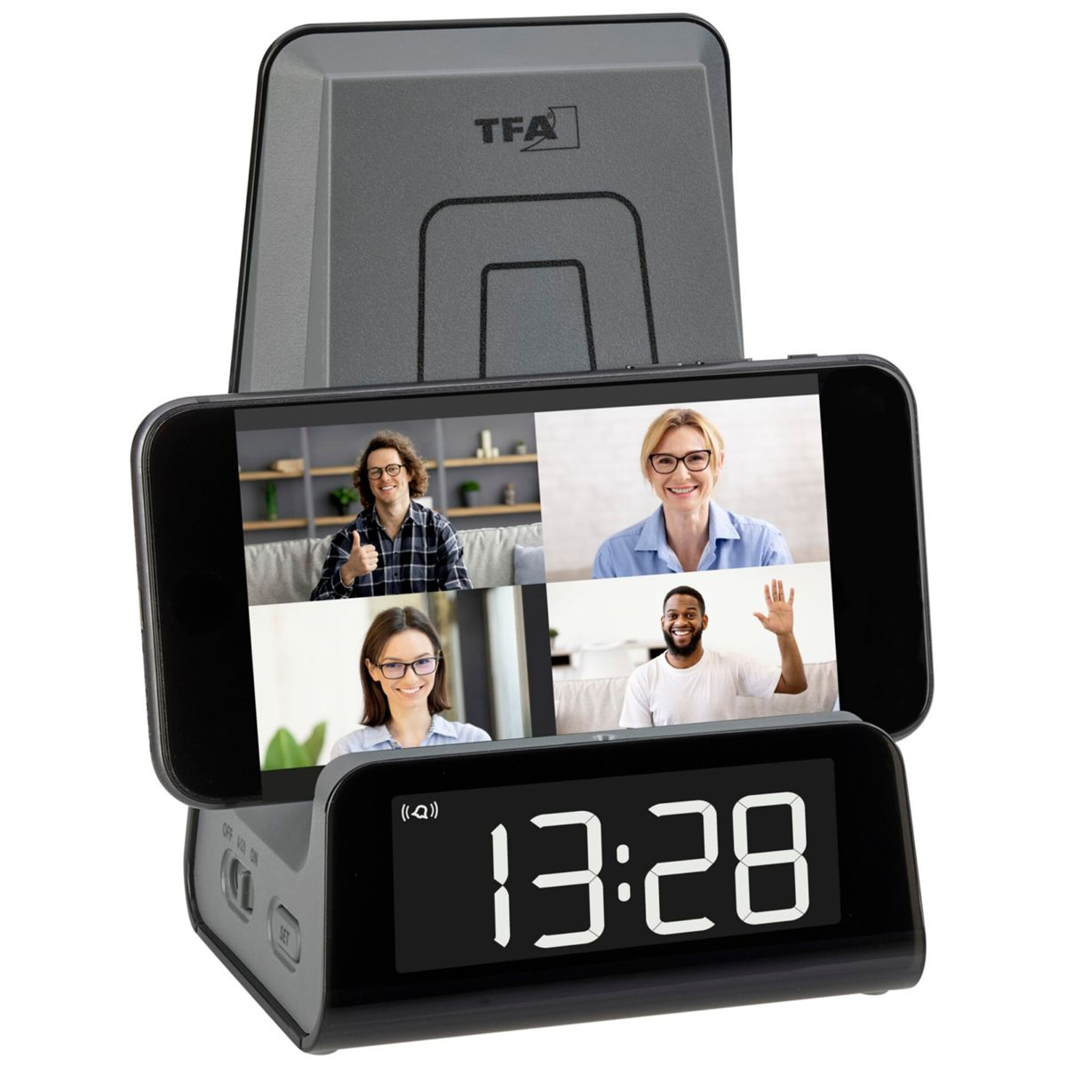 Schwarze Telefon-Dockingstation mit einem Telefon, das einen Videoanruf zeigt. Eine Digitaluhr ist sichtbar.