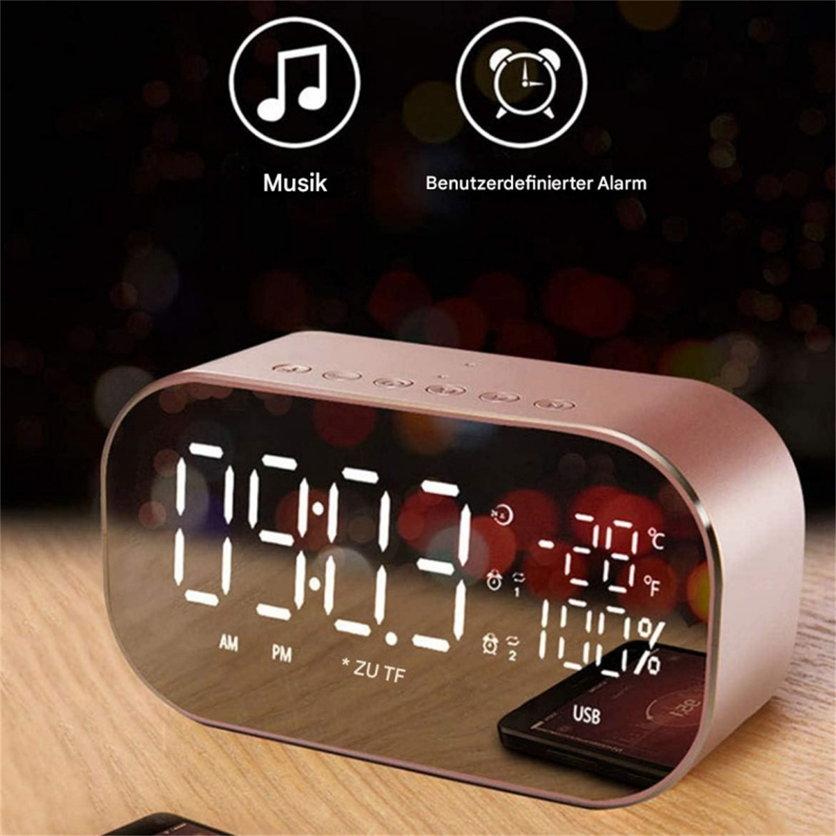 Roségoldener Radiowecker mit großem Digitaldisplay, das Zeit, Temperatur und andere Infos anzeigt. Ein Telefon ist unten.