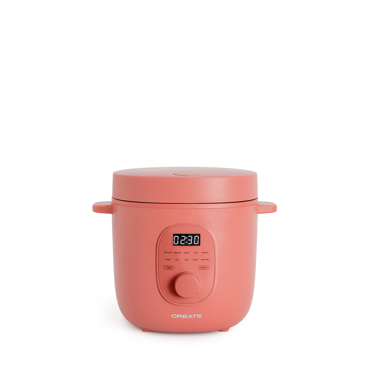 Un pequeño electrodoméstico color coral con pantalla digital y dial de control.