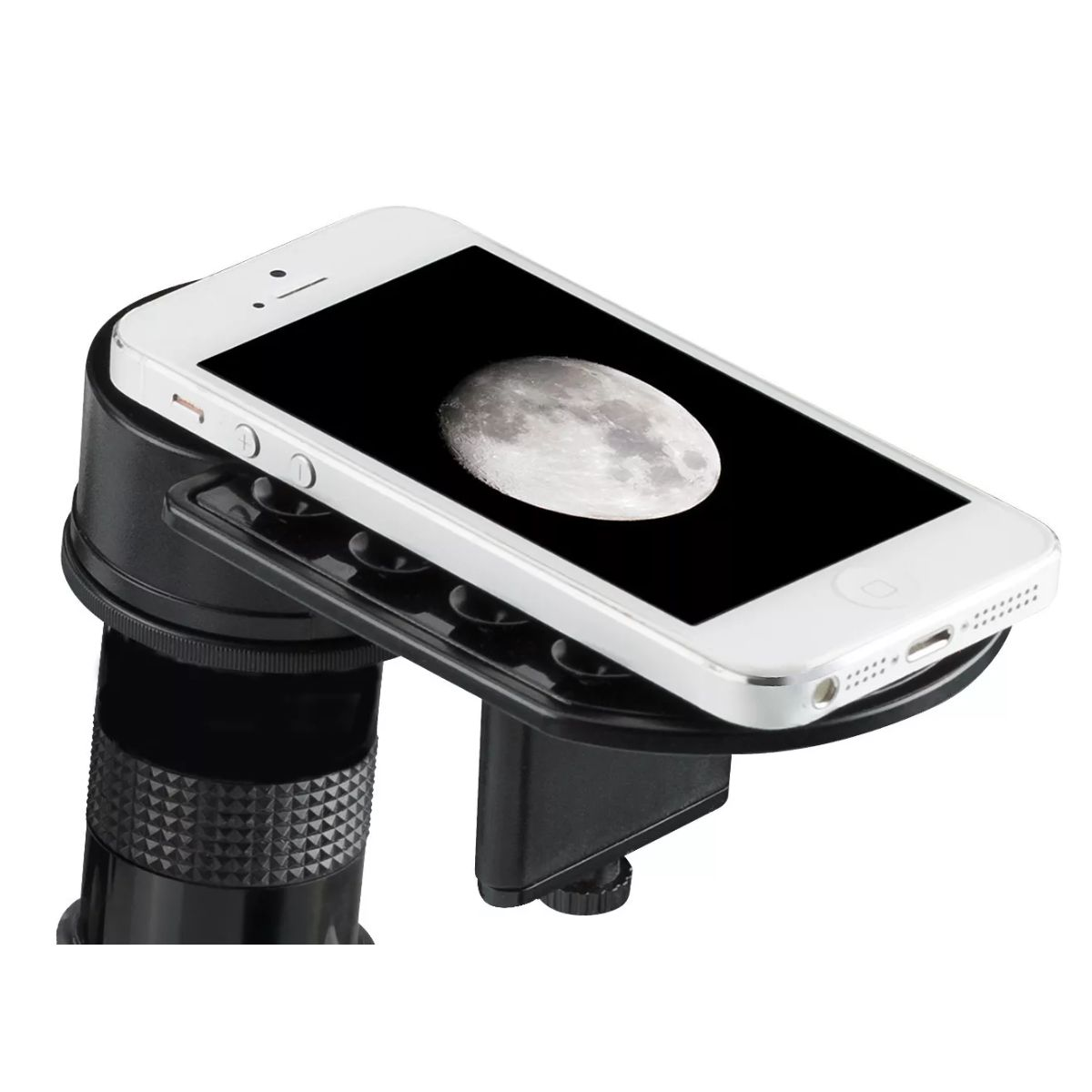 Un teléfono blanco está conectado a un dispositivo para ver una imagen lunar. El teléfono muestra una imagen de la luna.