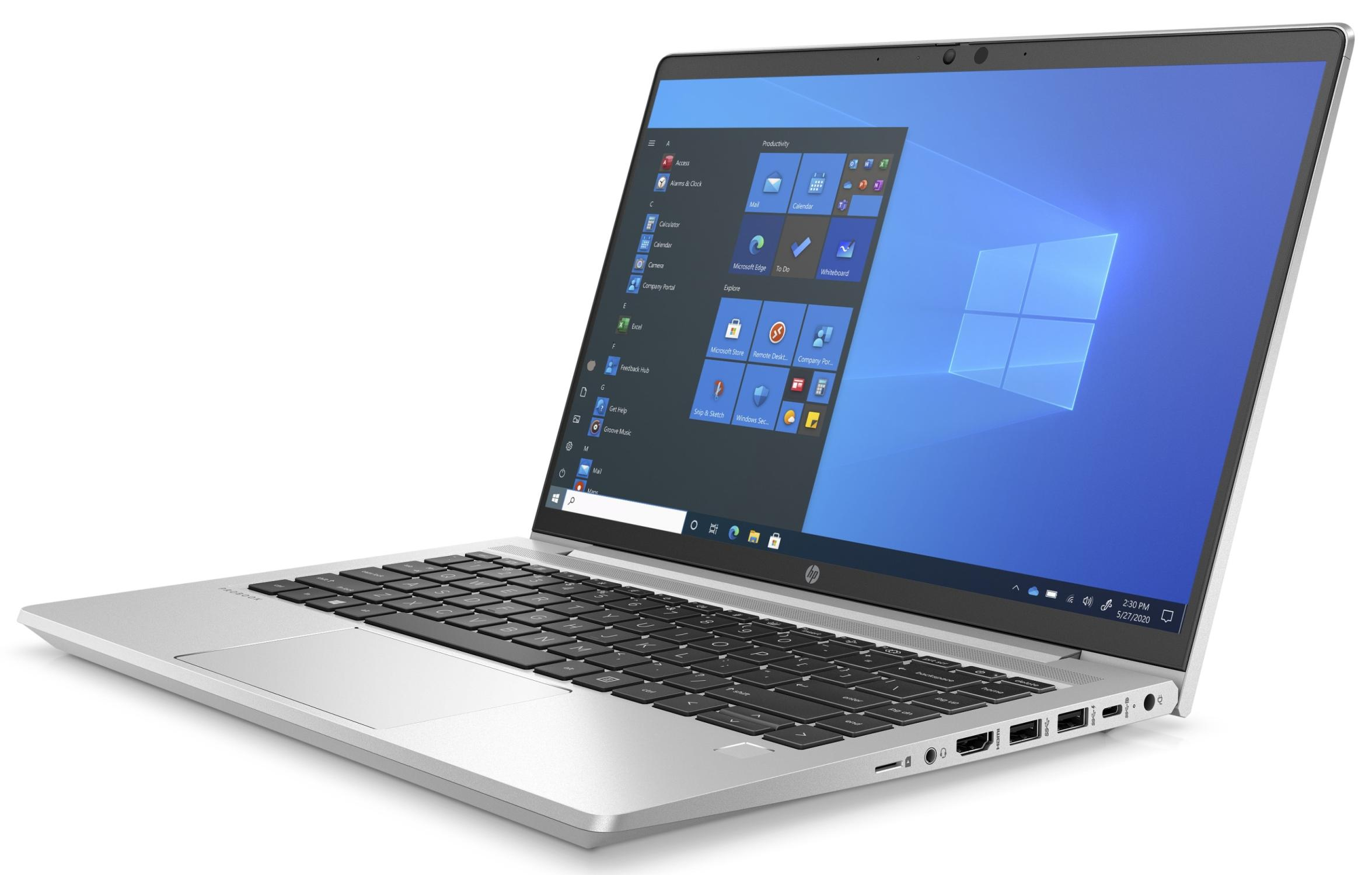 Ein silberner Laptop mit Tastatur und einem Bildschirm, der den Windows-Startbildschirm anzeigt.