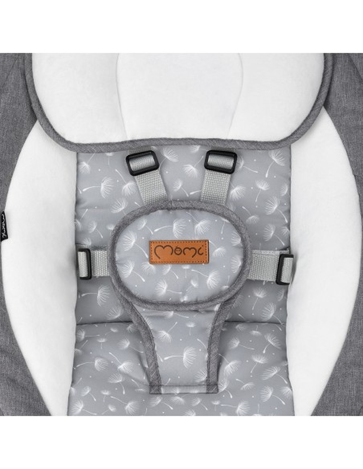 Babywippe, grau und weiß mit floralem Design, Sicherheitsgurte sichtbar.