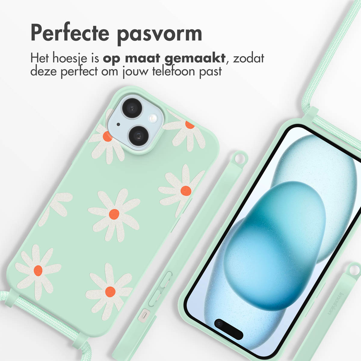 Telefoonhoesje met een madeliefpatroon, samen met een bijpassend koord en de telefoon erin.