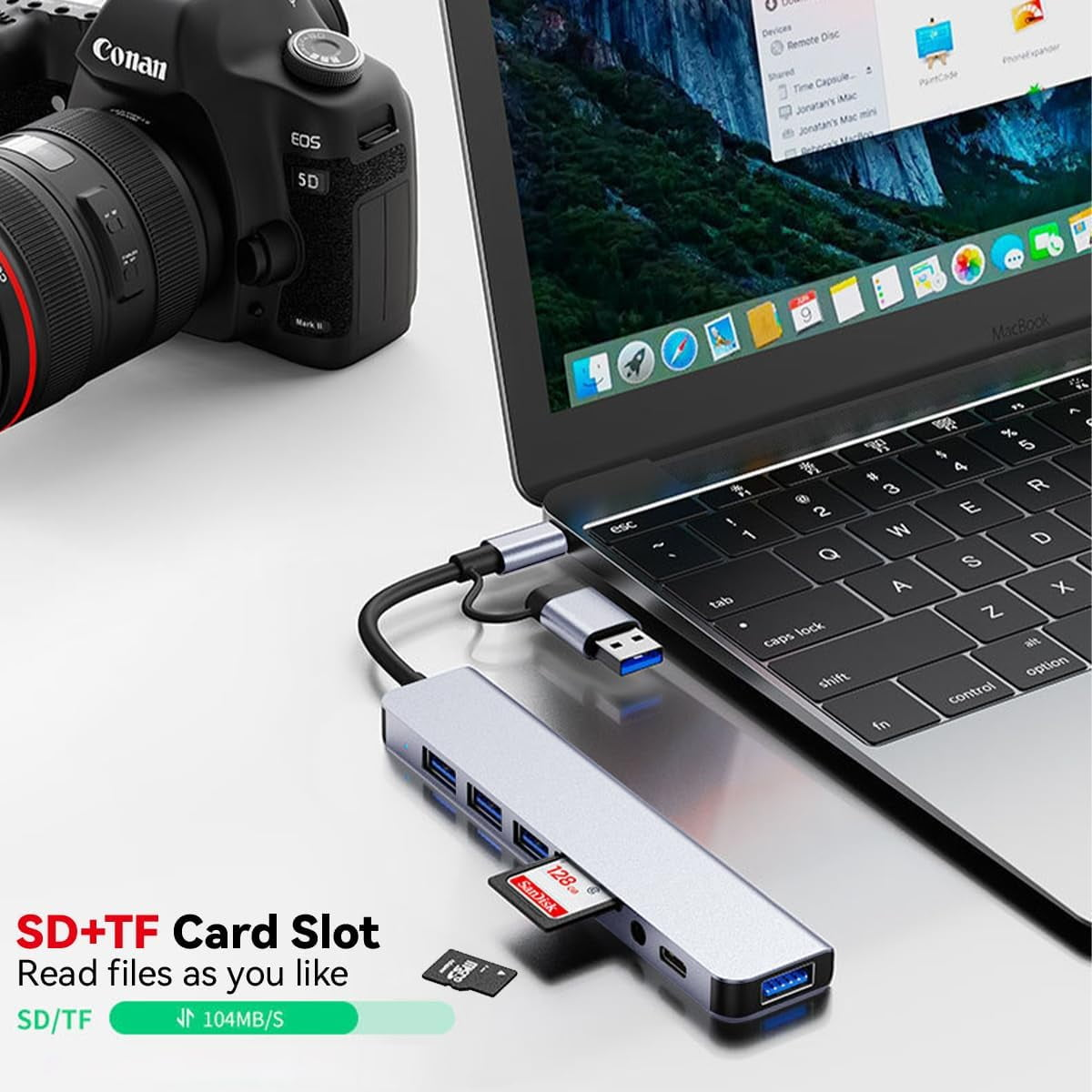 Laptop mit USB-Hub mit SD-Kartensteckplatz. Kamera links.