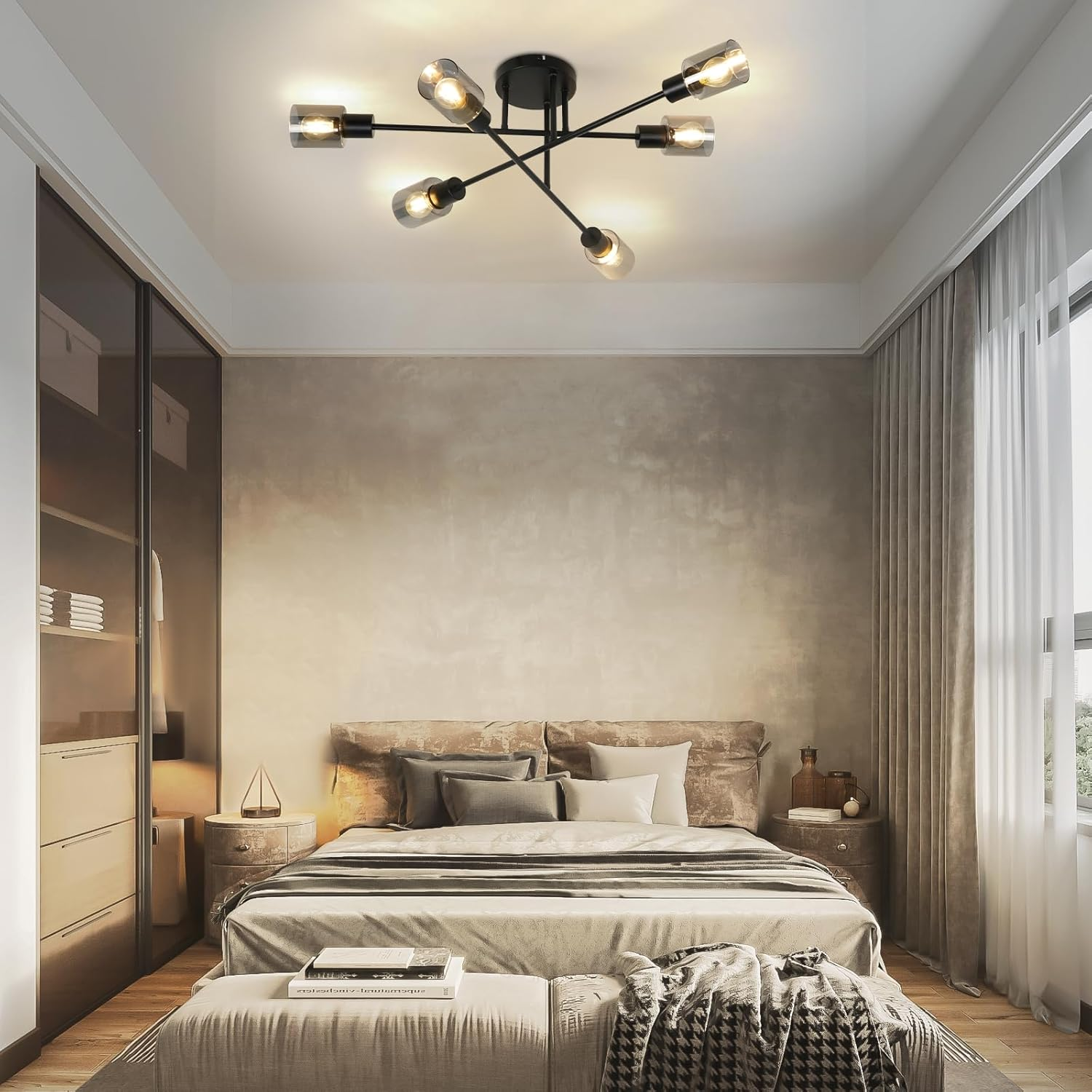 Nowoczesna sypialnia z łóżkiem, dwoma stolikami nocnymi, szafą i żyrandolem.