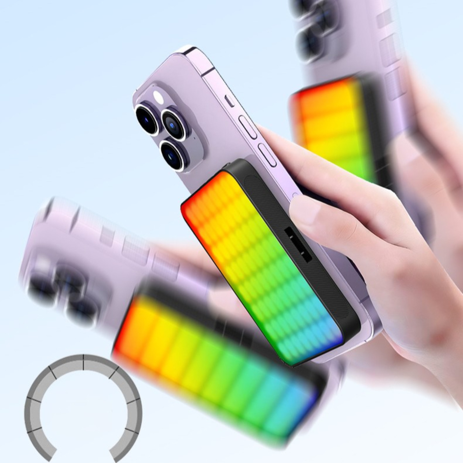 Ein Telefon mit Regenbogenlicht. Ein tragbares Ladegerät ist am Telefon befestigt.