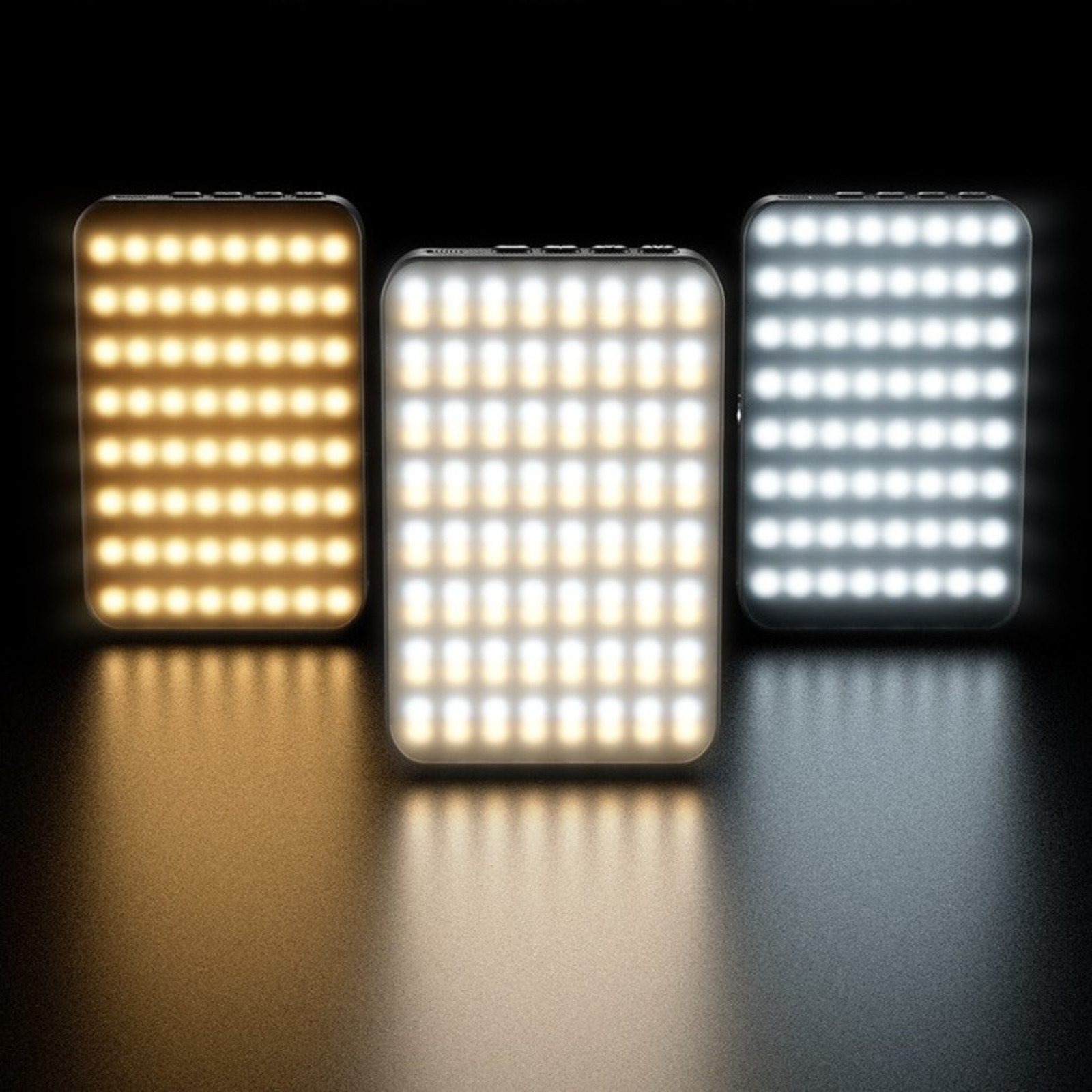 Drei rechteckige LED-Leuchten, die verschiedene Farbtemperaturen anzeigen: warm, weiß und kühl.