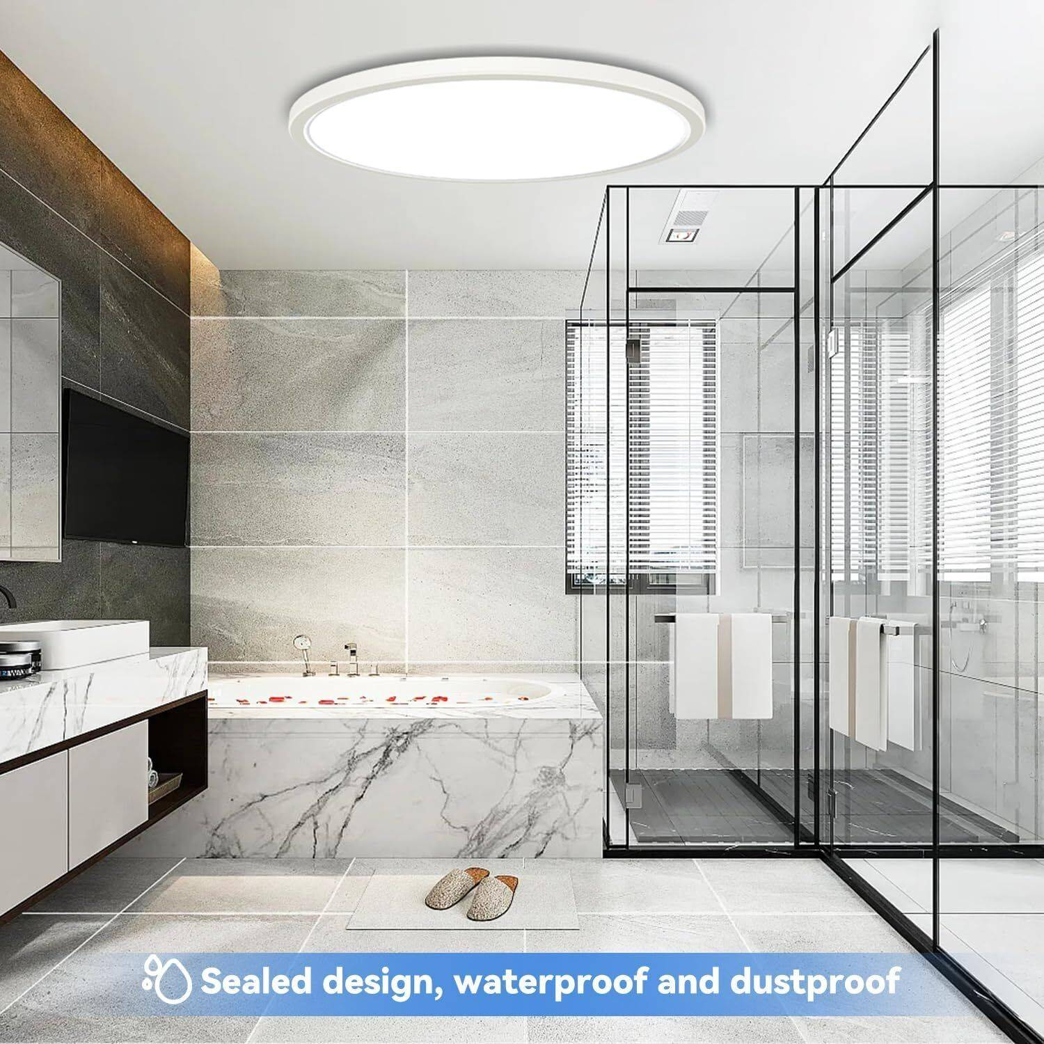 Badezimmer mit runder Deckenleuchte, Marmorbadewanne und Glasdusche. Text: abgedichtetes Design.