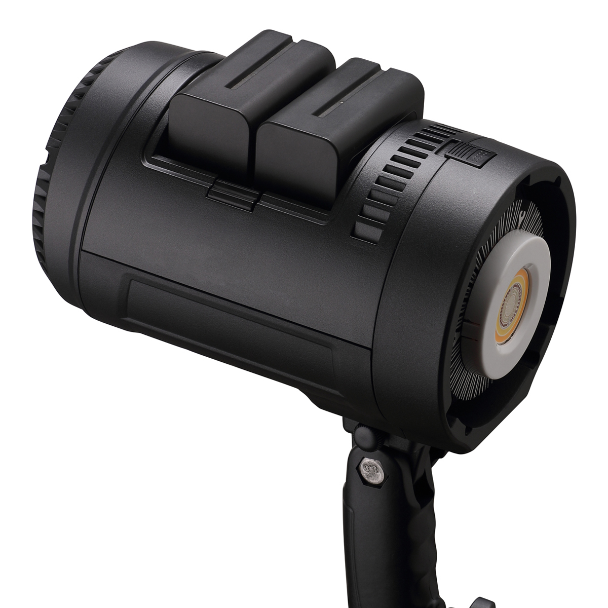 Lumière cylindrique noire avec batteries. Fond blanc.