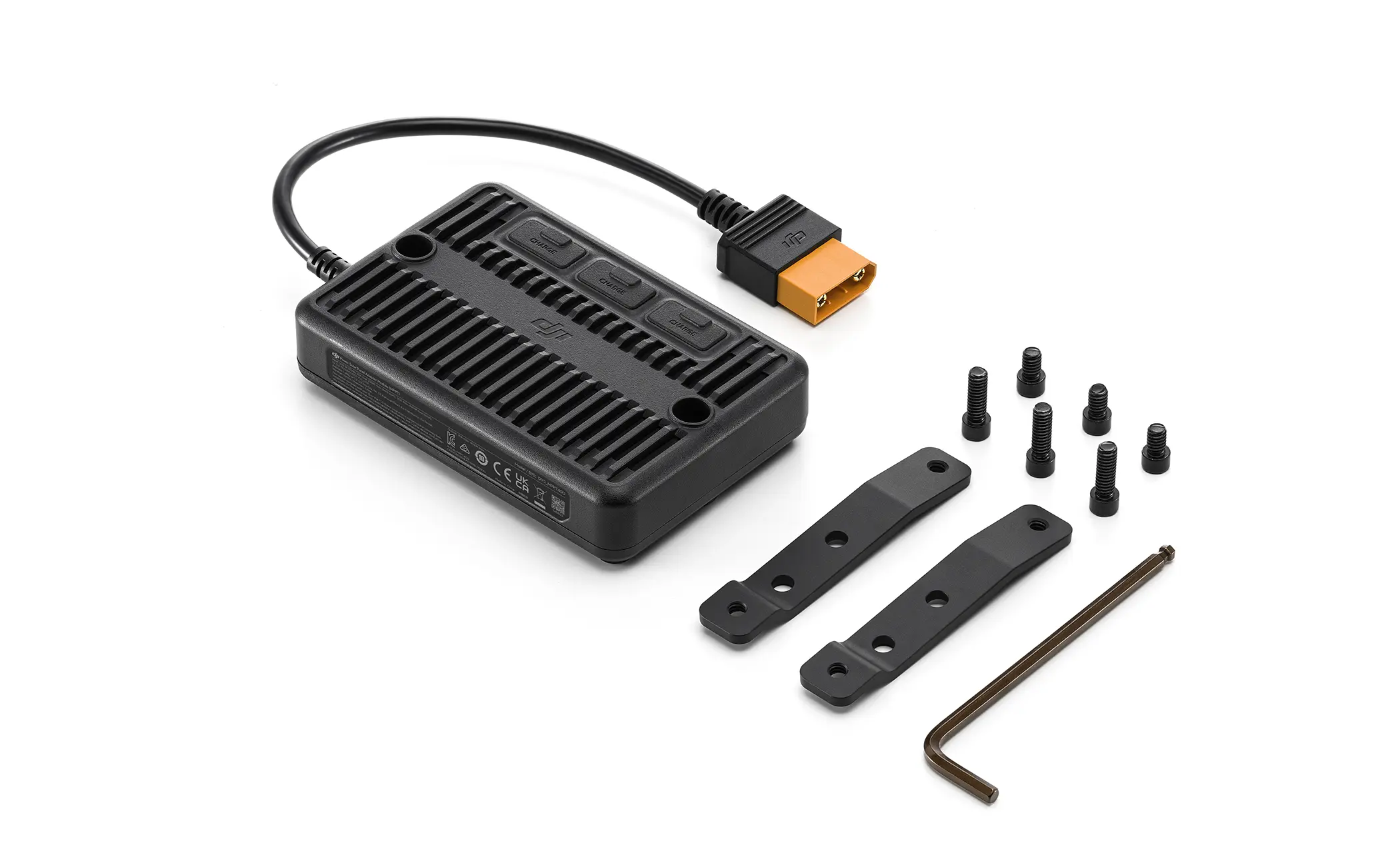 Schwarzes Gerät mit Kabel, Anschluss und Halterungen, mit Schrauben und einem Schraubenschlüssel.