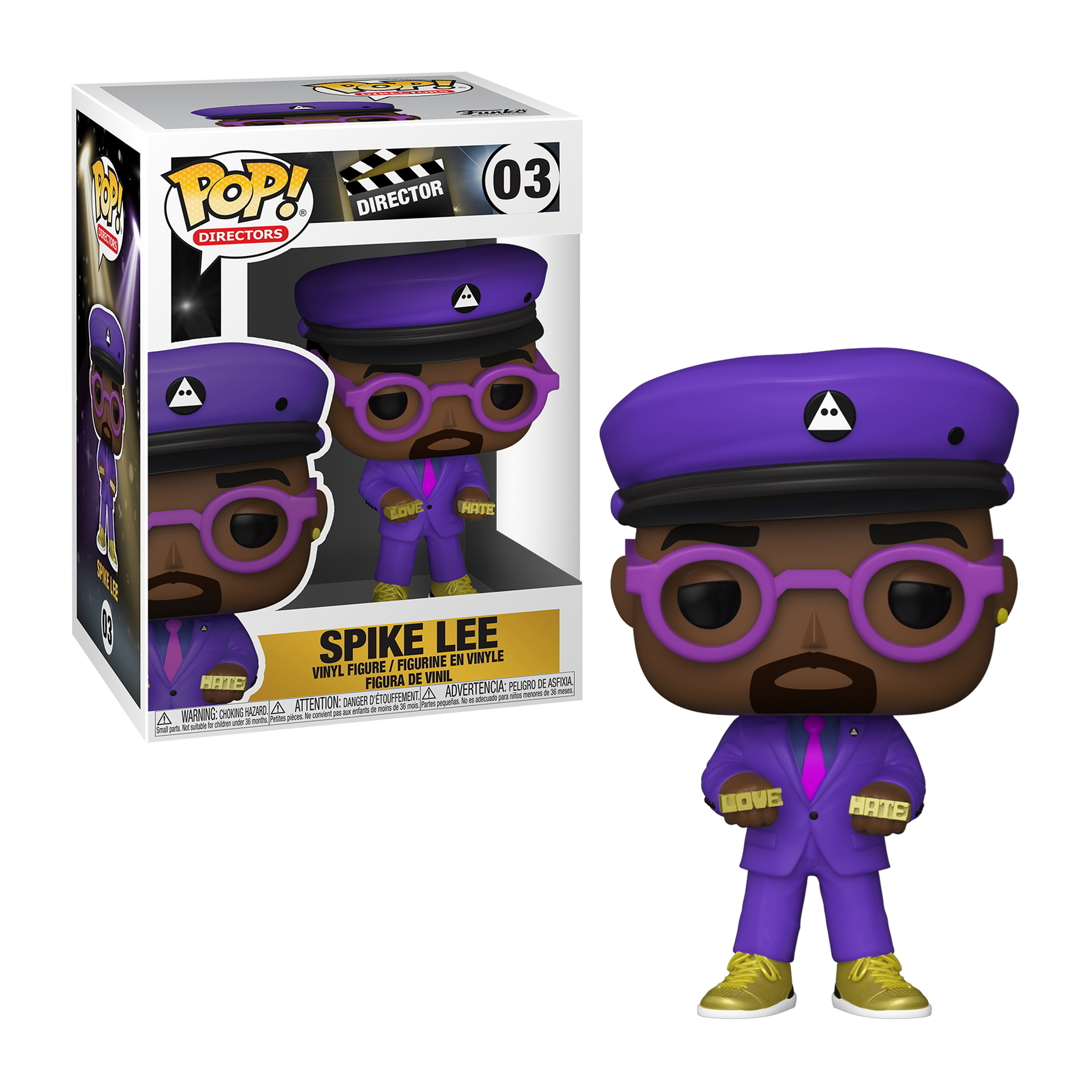 Eine Spike Lee Funko Pop Figur in einer Box. Die Figur trägt einen lila Anzug, eine Brille und eine Baskenmütze.