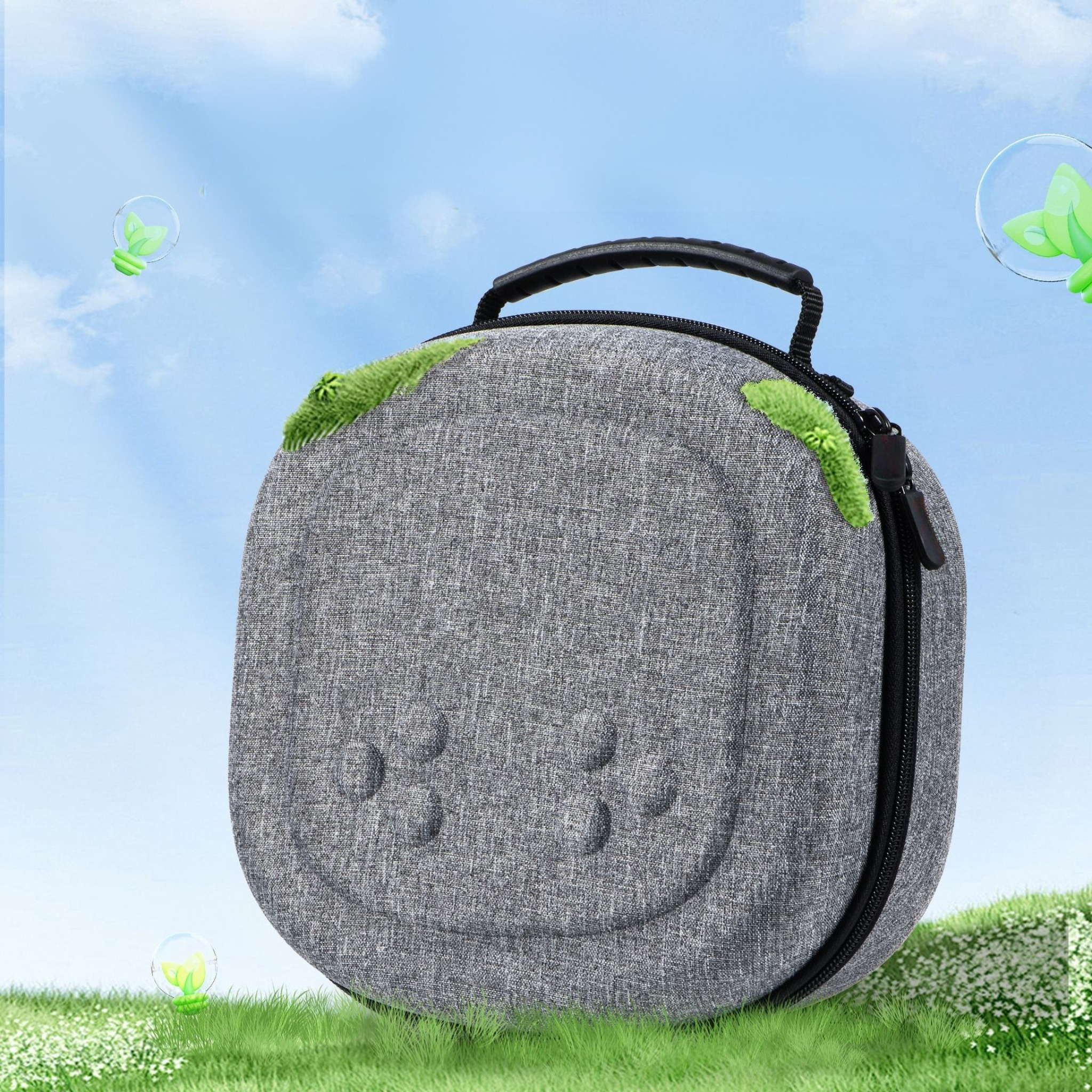 Graue, ovale Hülle mit Griff. Grüne Akzente auf Gras und Himmel.
