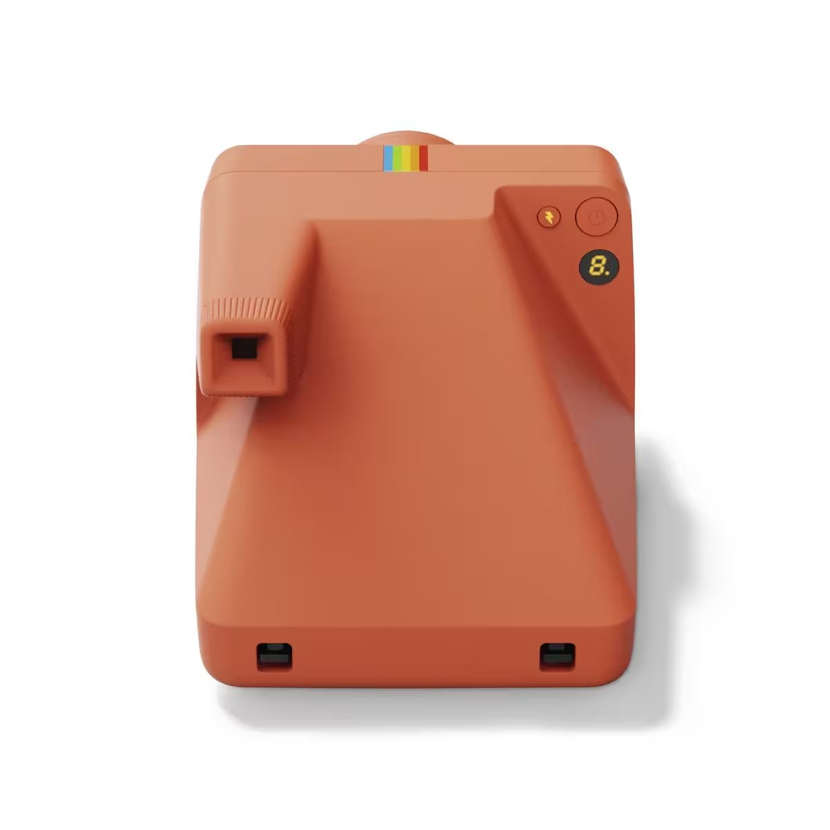Un appareil photo Polaroid orange. Il a une bande arc-en-ciel sur le dessus et un objectif noir.