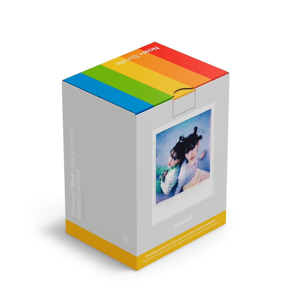 Pudełko po aparacie Polaroid z tęczowym wzorem na górze i zdjęciem z boku. Tekst mówi Polaroid Now+ App Control.