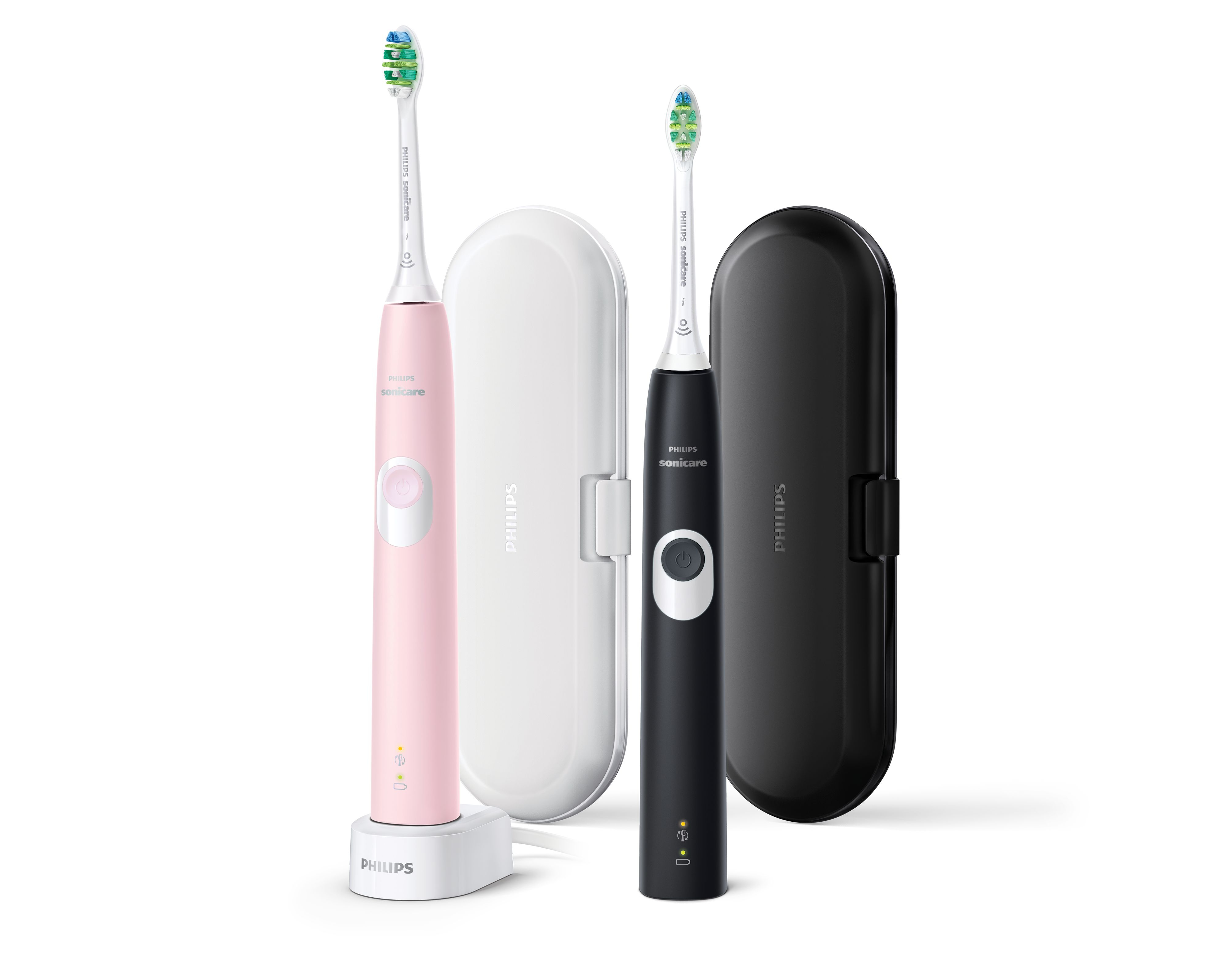 Cepillos de dientes eléctricos rosa y negro, bases de carga y estuches, aislados sobre fondo blanco.