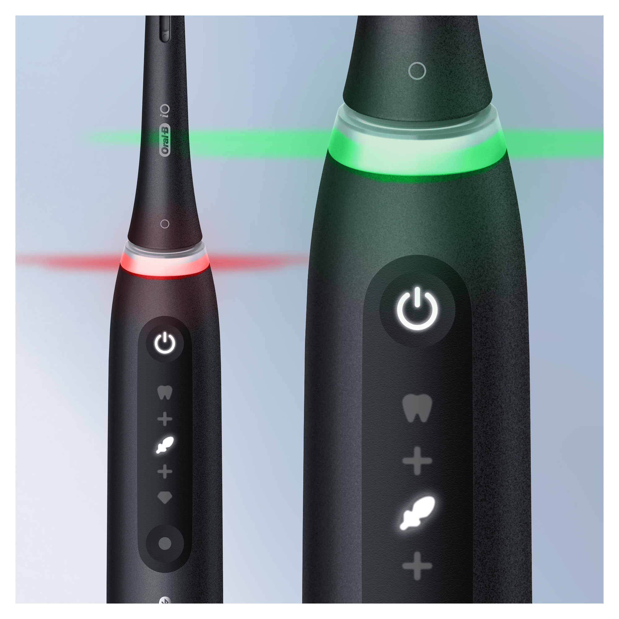 Elektrische Zahnbürste mit leuchtenden Lichtern; rote und grüne Farben sind sichtbar.