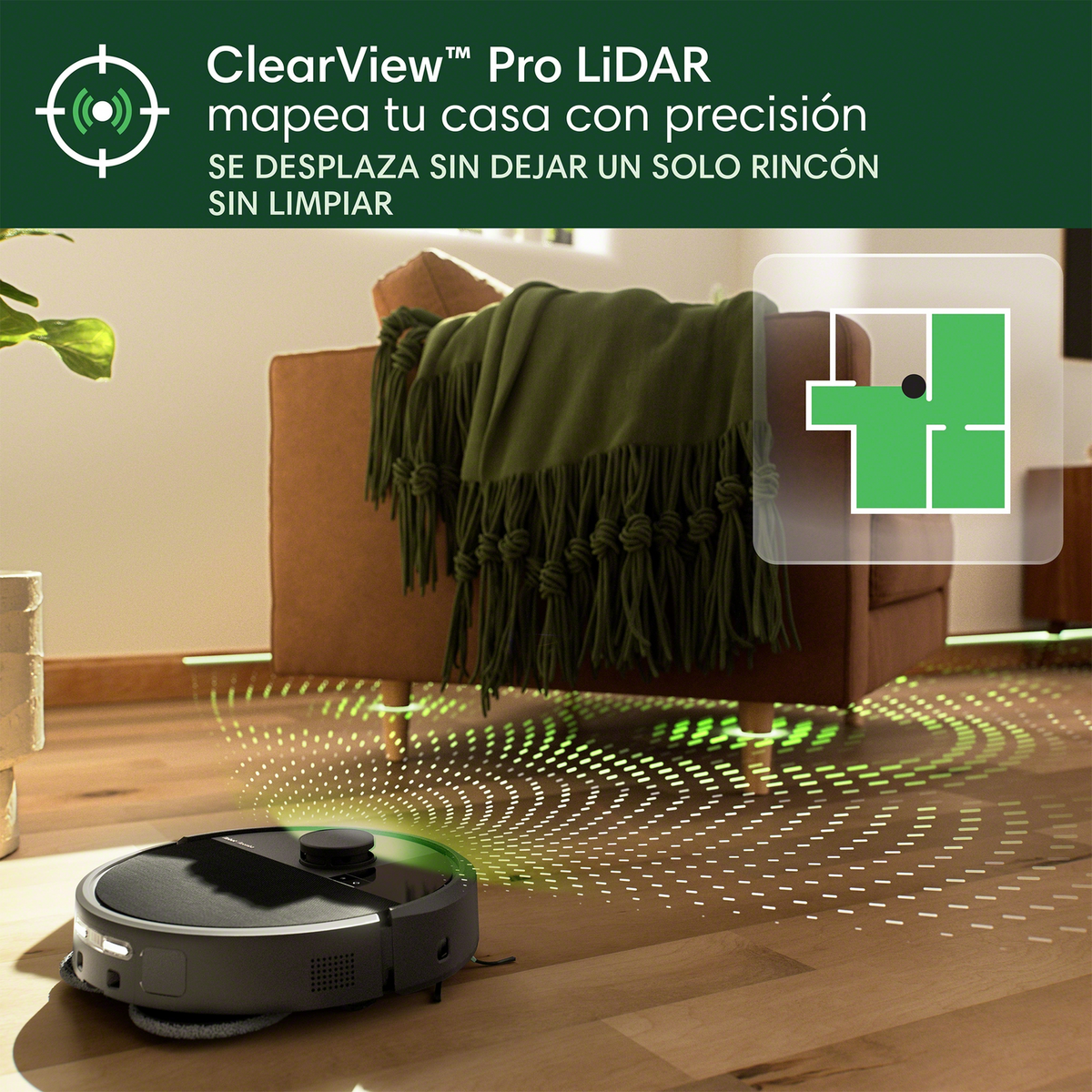 Robot sprzątający mapujący pomieszczenie. Zielona sofa i plan domu w tle.