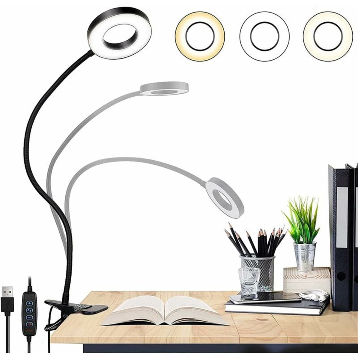 Ringlicht mit drei Lichteinstellungen, ein Buch, Bleistifte und ein Stifteständer auf einem Schreibtisch.