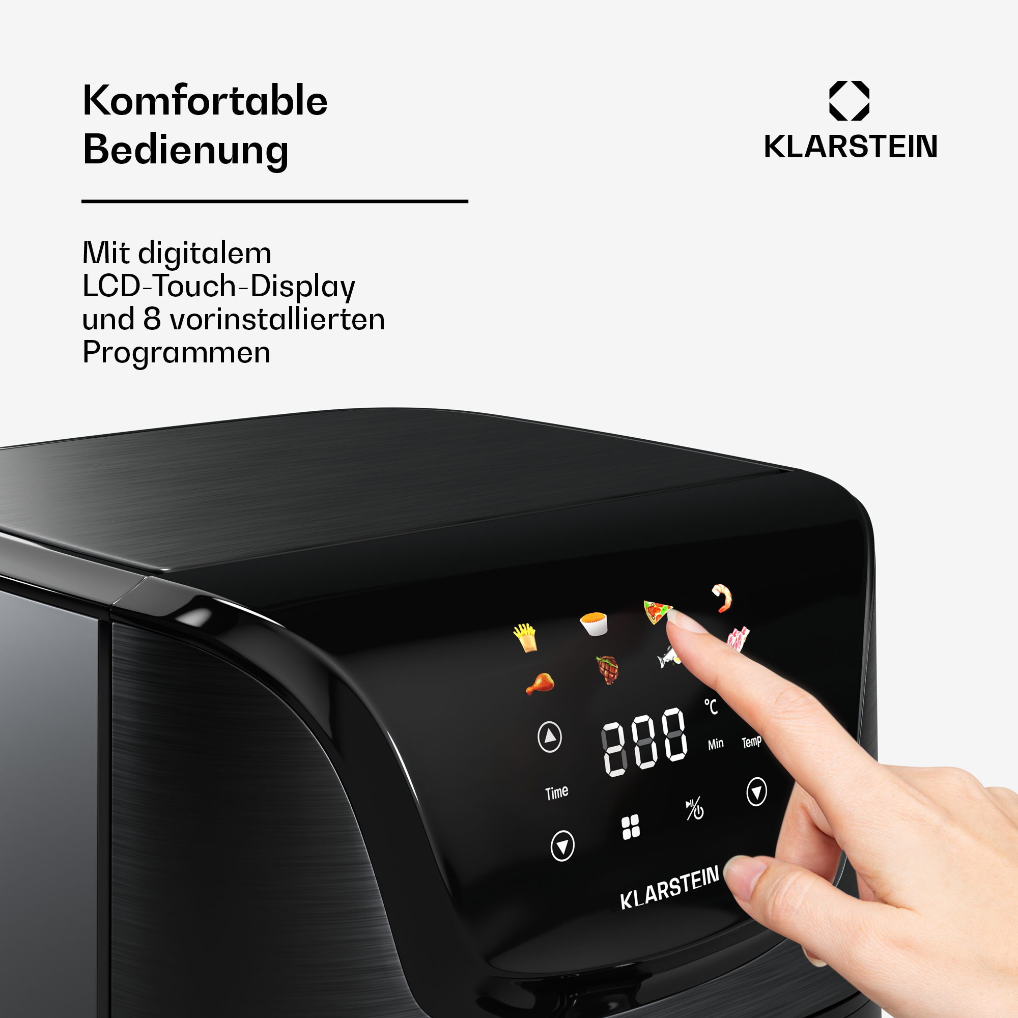 Una friggitrice ad aria nera con display digitale e una mano che tocca lo schermo. Testo tedesco.