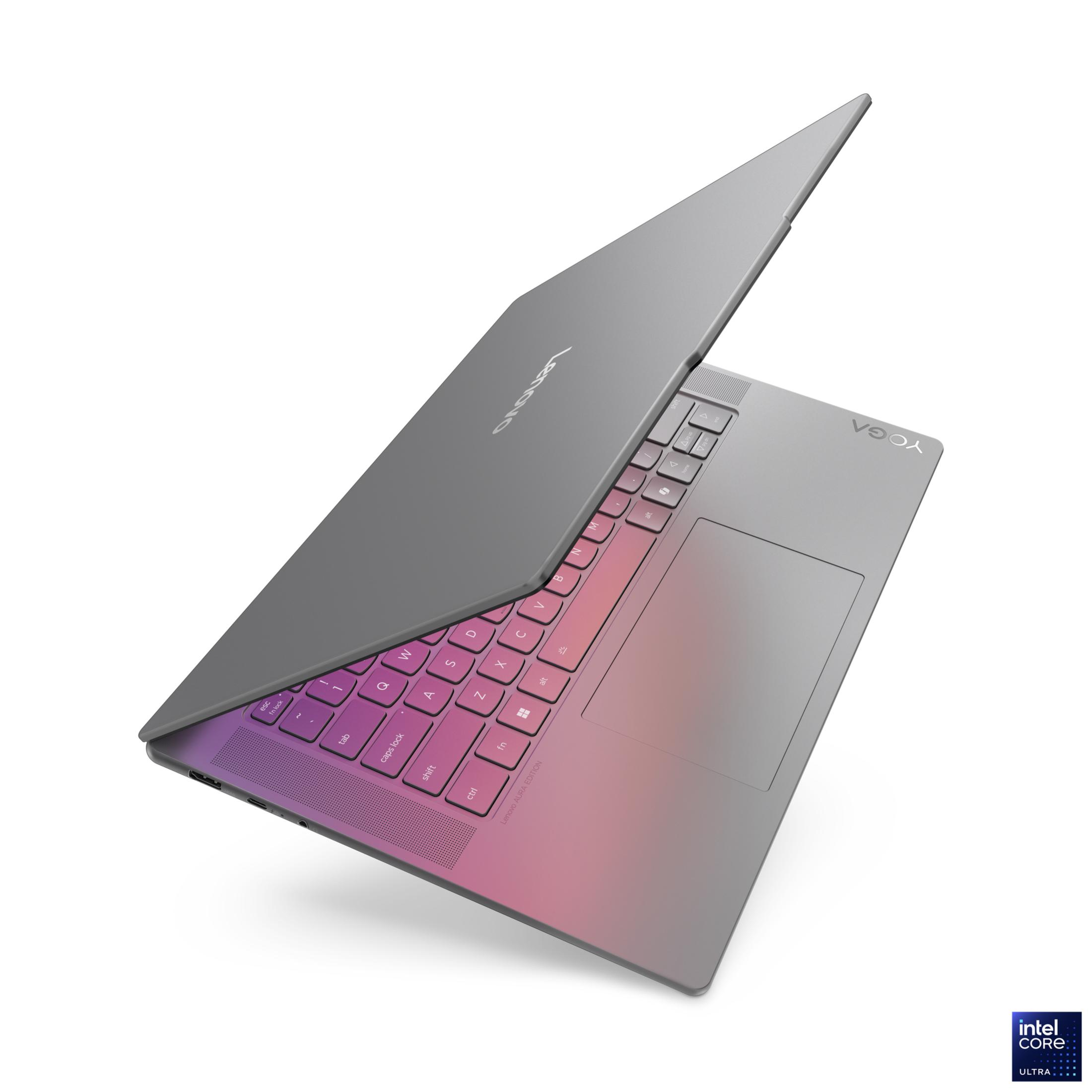 Lenovo Yoga Laptop, offen, angewinkelte Ansicht. Tastatur beleuchtet mit rosa und lila Farbverlauf.