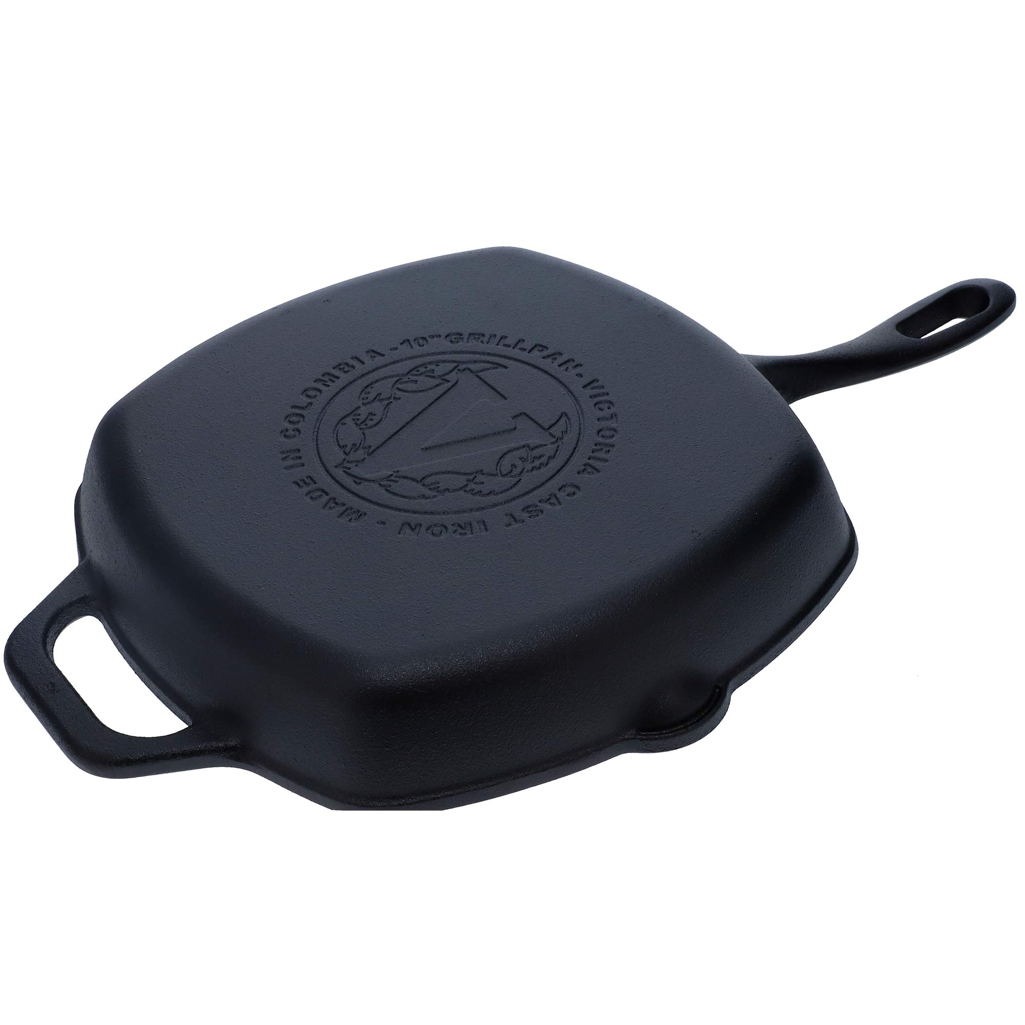 Sartén parrilla cuadrada de hierro fundido negro con asa. La sartén está hecha en Colombia, con un logotipo.