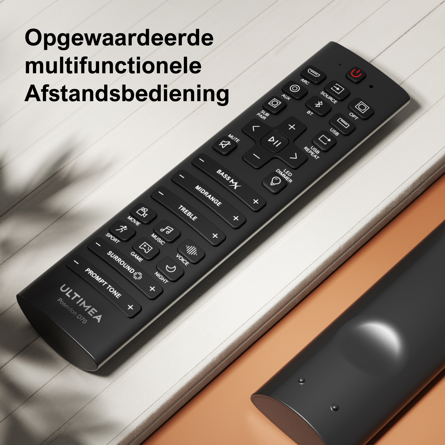 Een zwarte afstandsbediening met veel knoppen. De afstandsbediening ligt op een lichtgekleurd oppervlak. Een tweede afstandsbediening.