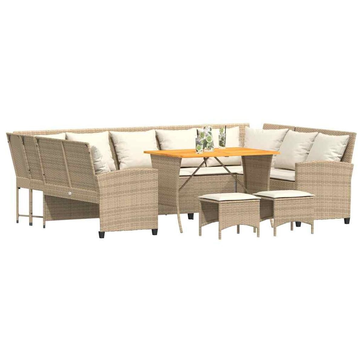Un set di mobili da esterno in rattan con un tavolo, due sgabelli e un divano componibile con cuscini.