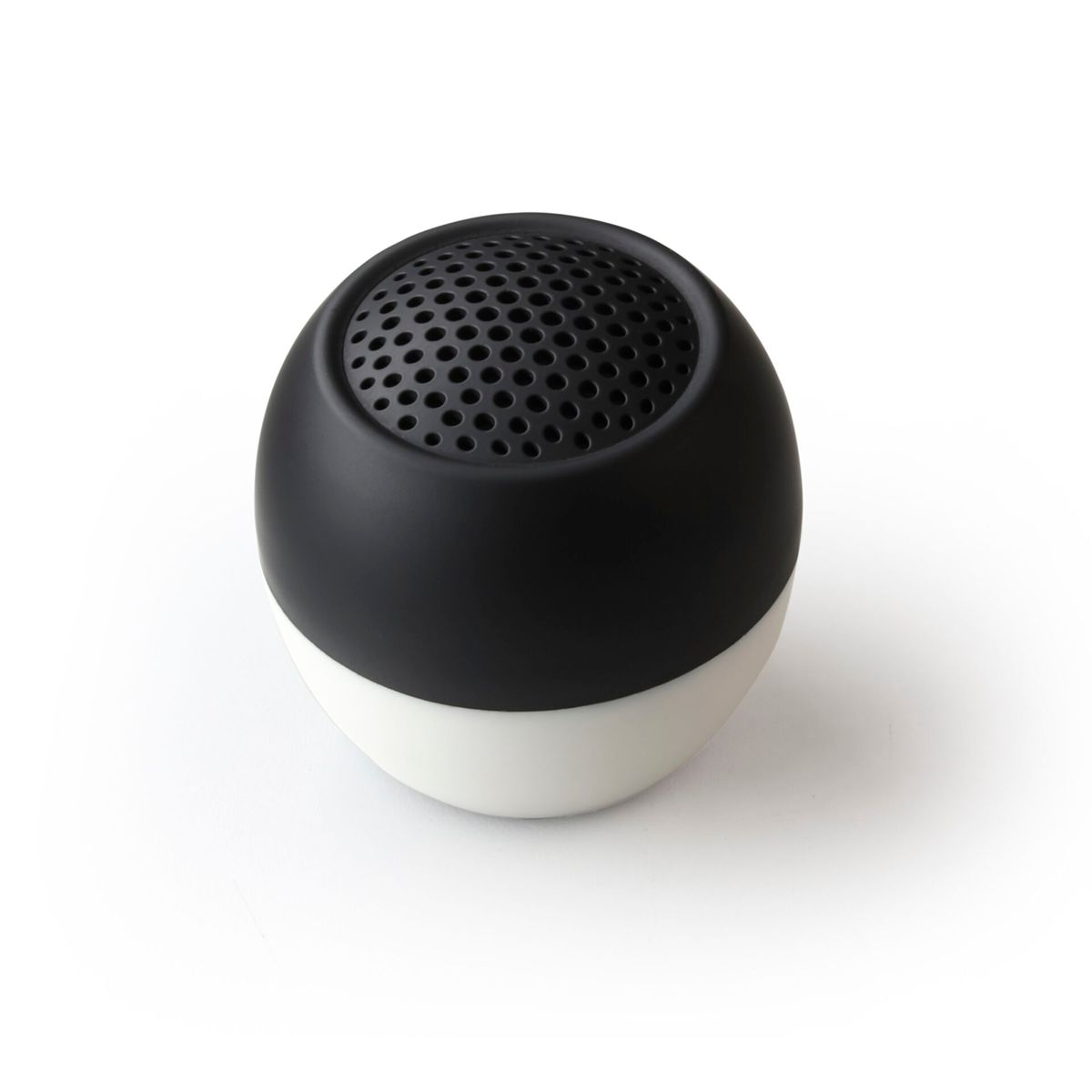Czarno-biały głośnik w kształcie jaja. Ma czarną górę z otworami i białą podstawę.