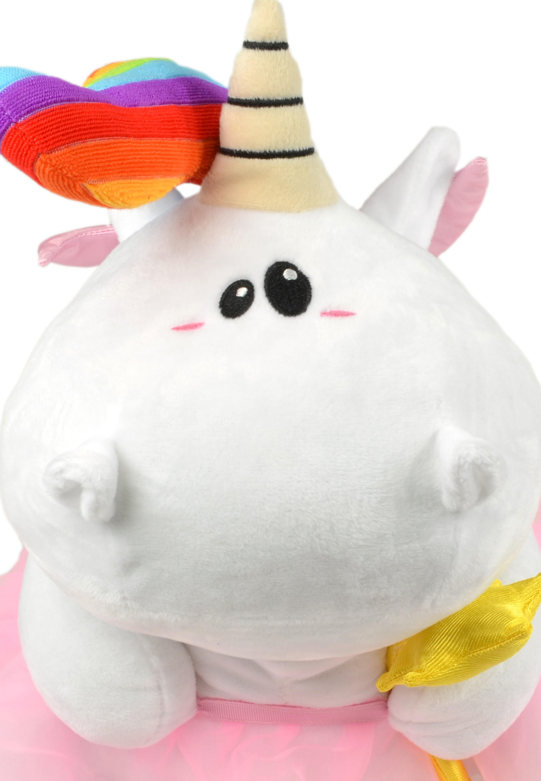 Ein weißes Einhorn-Plüschtier mit Regenbogenmähne, Schwanz und Horn. Das Spielzeug trägt einen rosa Tutu.
