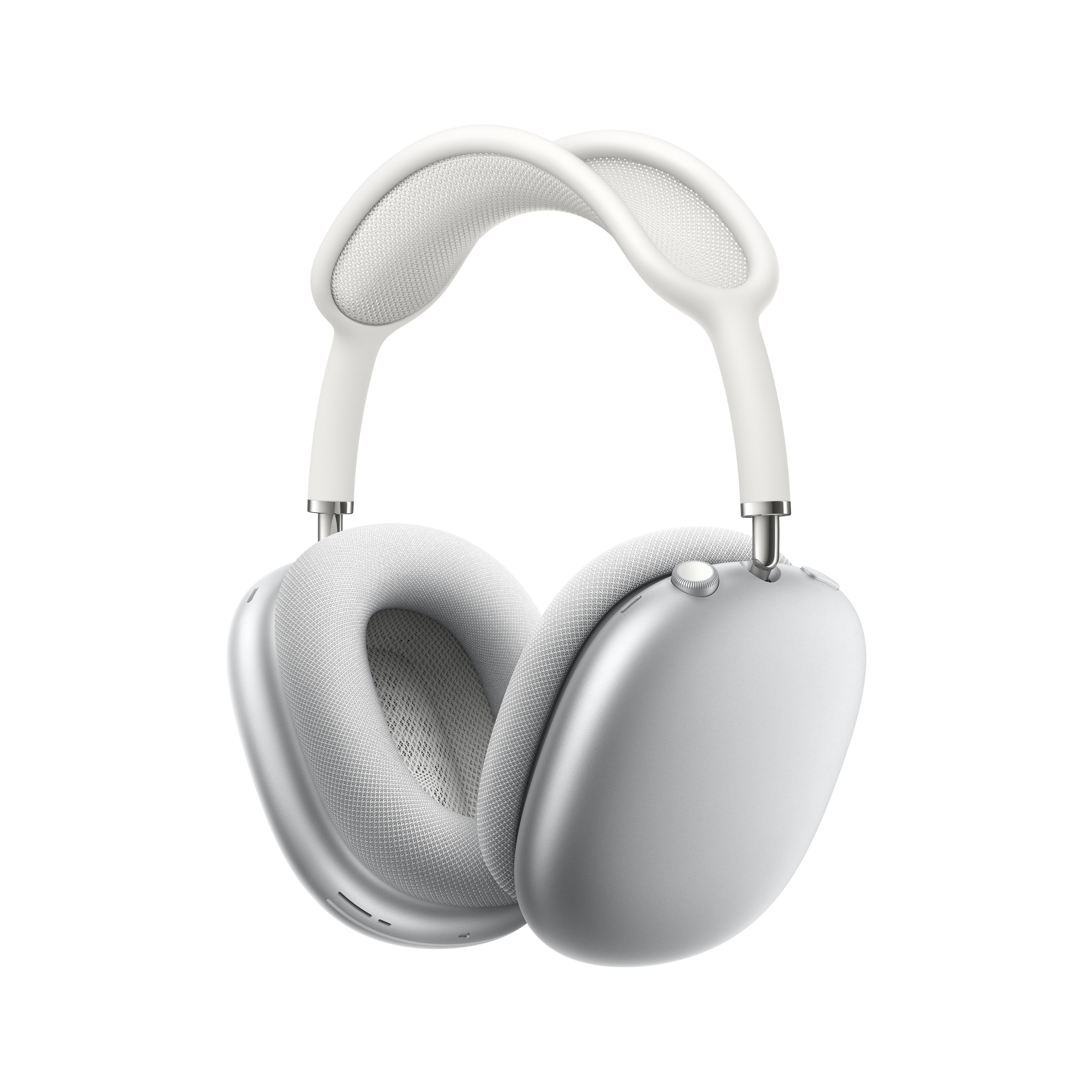 Auriculares blancos sobre la oreja. Detalles y copas plateadas. Fondo blanco.