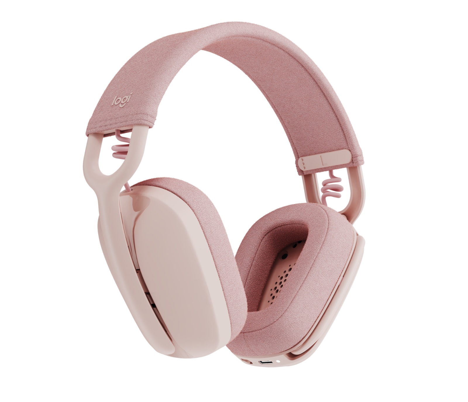 Cuffie rosa sopra le orecchie. Padiglioni e fascia imbottiti. Sfondo bianco.