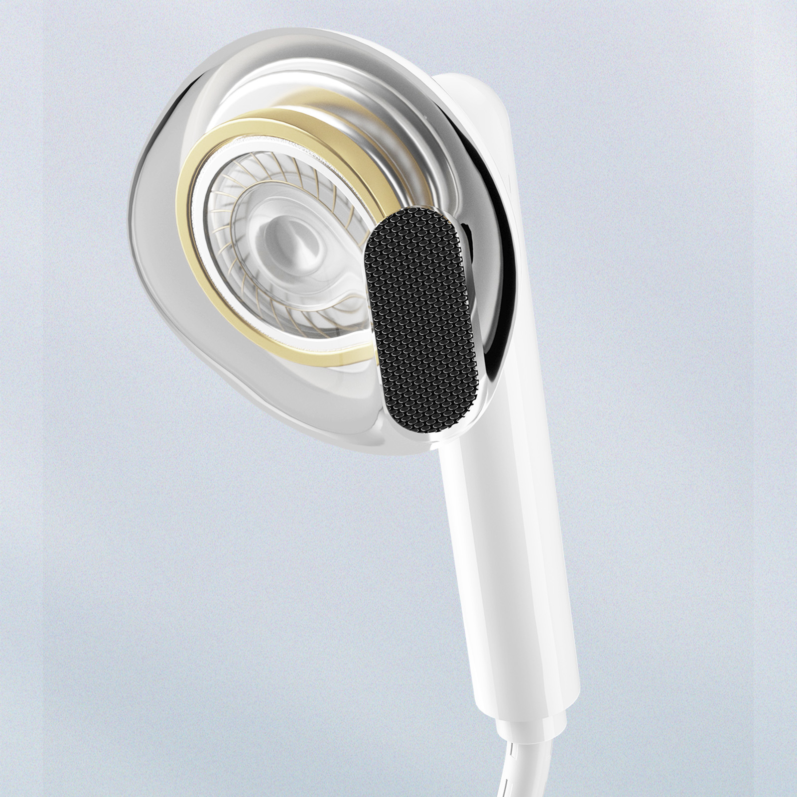 Auricolare bianco in-ear con guscio esterno trasparente. All'interno un componente dorato e una rete nera.
