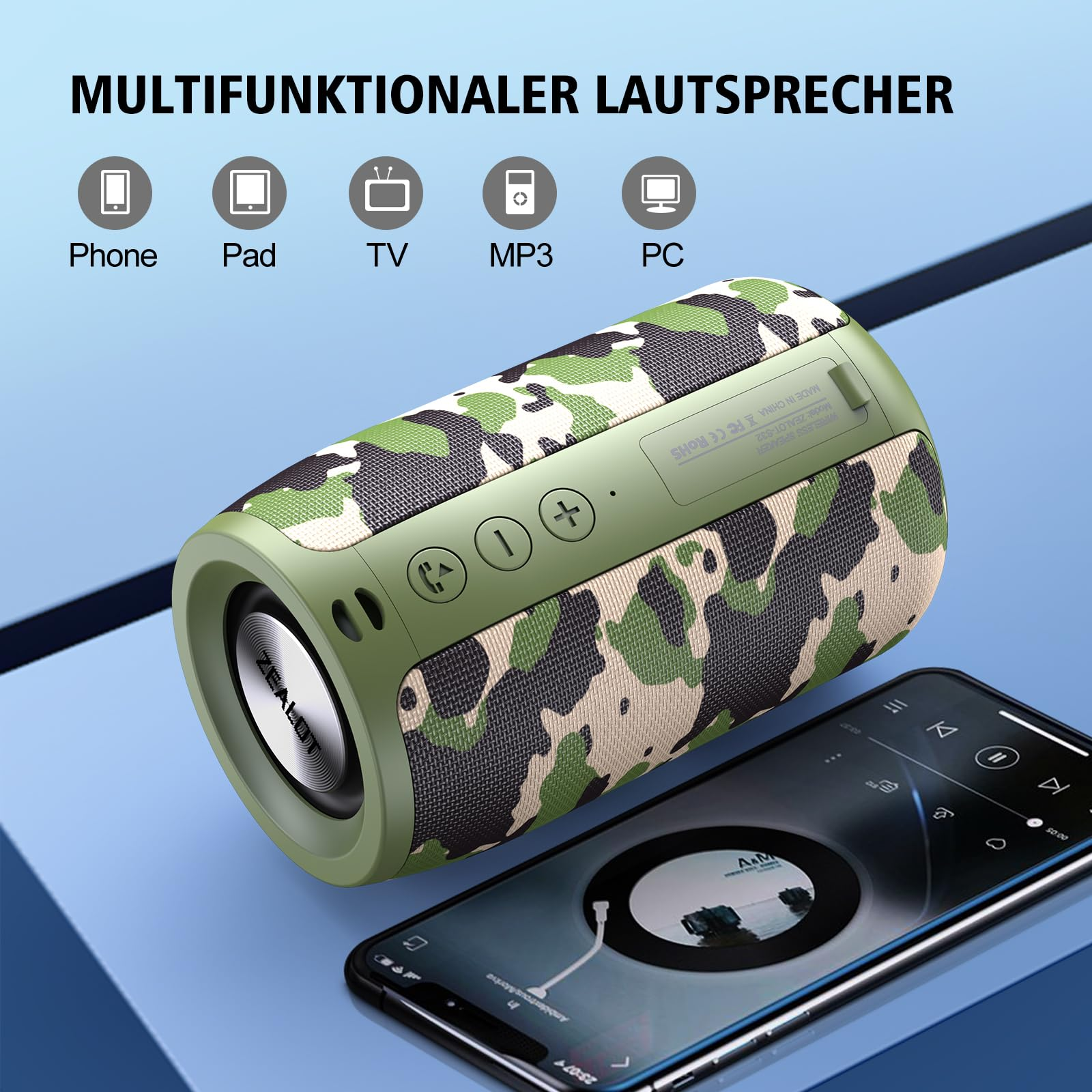 Ein tragbarer Lautsprecher in Tarnmuster, mit Musik auf dem Handy.