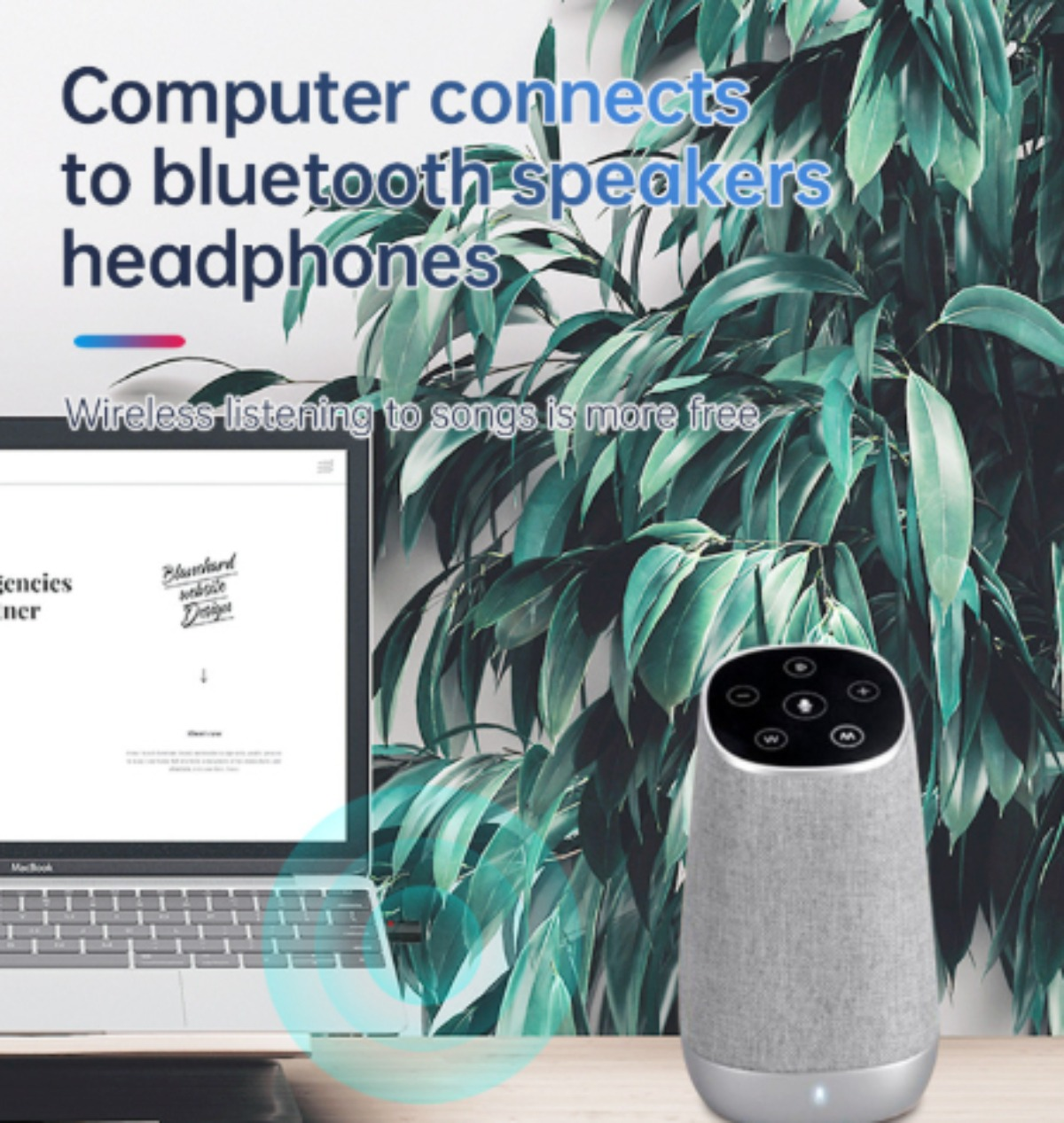 Computer mit Bluetooth-Lautsprecher verbunden. Der Lautsprecher ist grau und zylindrisch.